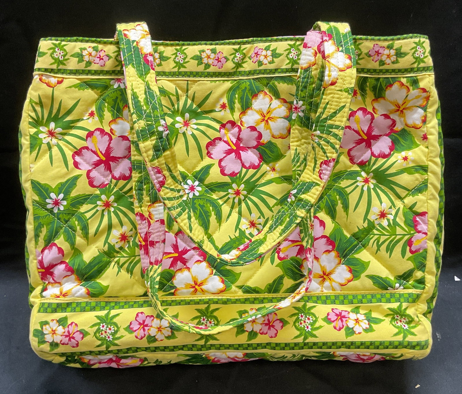 Americana by Sharif Yellow Quilted Handbag: Americana by Sharif yellow quilted handbag with floral print. Material feels like cotton. Signed on label. Multiple interior and exterior pocket. Measures approx 13.5 x 4 x 10 inches. Some wear to mat