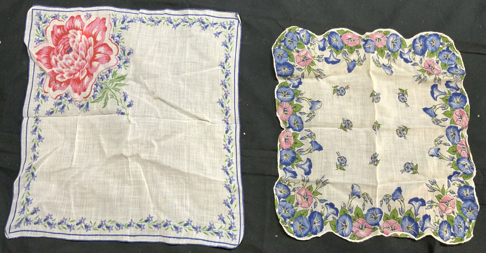 Lot 2 Vintage Floral Handkerchiefs: Lot includes 2 hankies. Each have differing multi toned floral detailing. Largest linen measures approximately 12 inches square. Hankies, fashion accessories, handkerchiefs. Evident staining & wear. 6