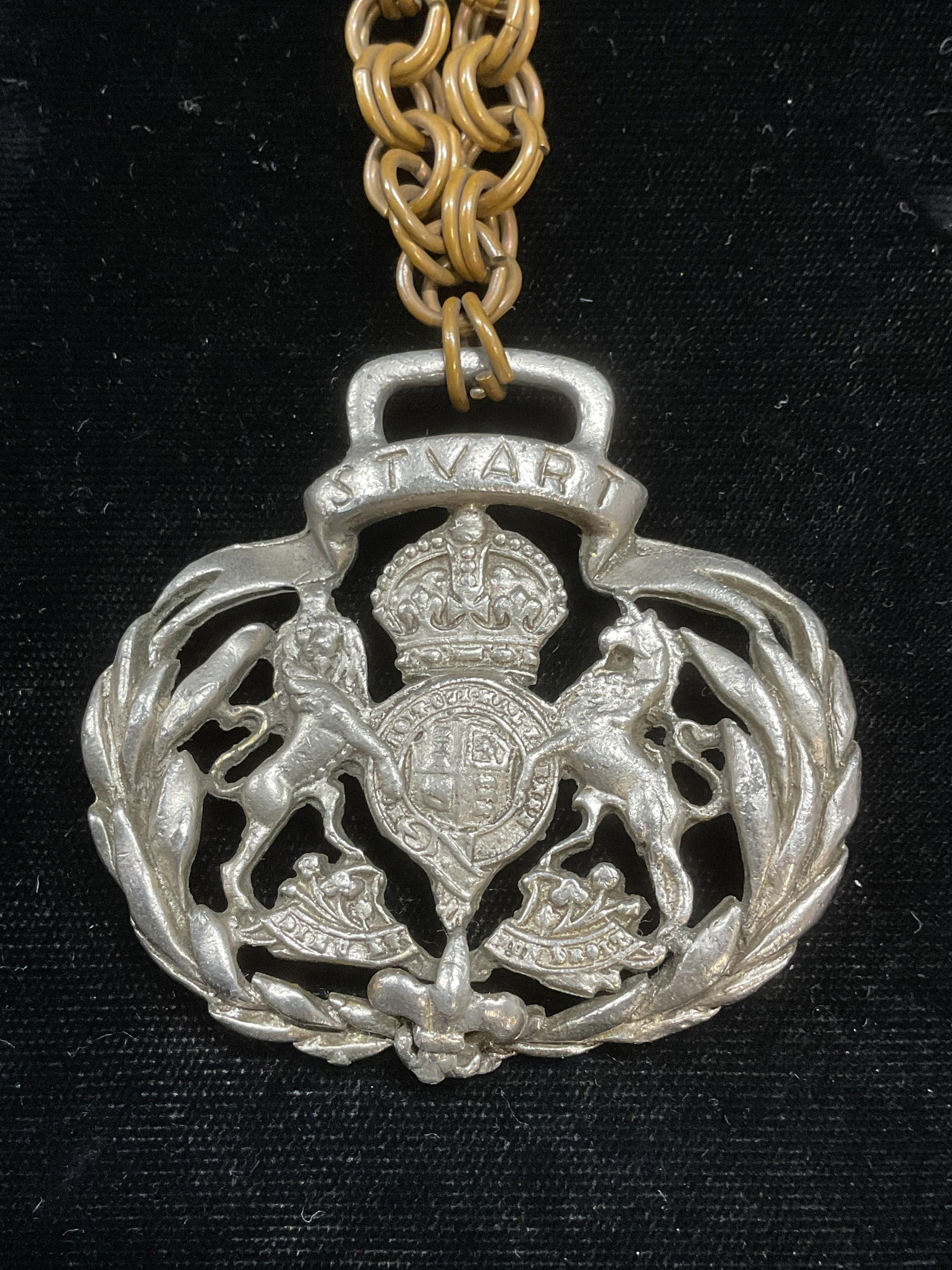 Vintage Horse Medallion Pendant Necklace: Vintage silver tone horse medallion pendant necklace with gold tone chain. Drop length approx 9 inches. Medallion measures approx 2 x 2.25 inches. Some wear including scratching. Jewelry, costume jewe