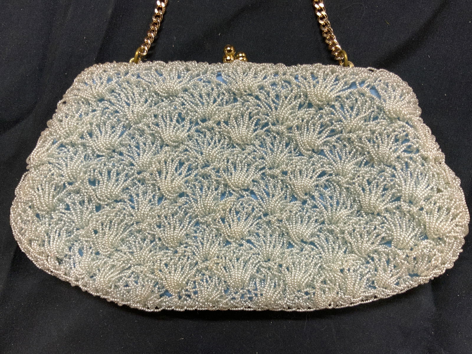 RON GIMBELS Vtg Beaded Clutch W Chain Link Strap: Tag on interior reads RON GIMBELS MADE IN JAPAN. Piece appears to be vintage. Clutch exterior is beaded and Ice blue toned. Piece has gilt metal chain link & kiss clasp. Interior has 1 open pocket. Pi
