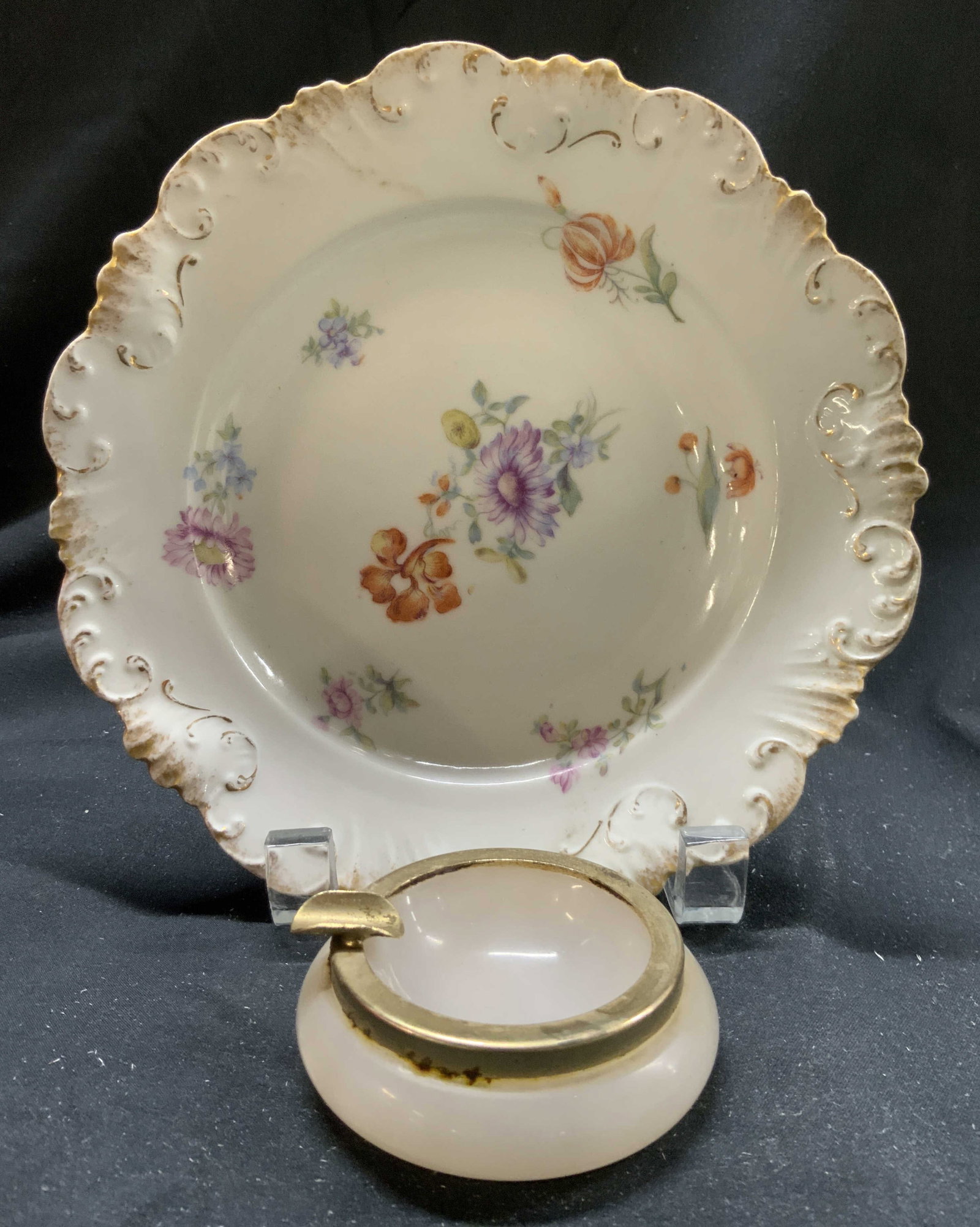 Lot 2 LIMOGES Porc Dish & Glass Trinket Dish: Lot includes 1 porcelain dish marked LIMOGES FRANCE on underside, & 1 white toned art glass trinket dish/ash tray with gilt rim. Porcelain dish has multi toned floral & leaf detail. Piece measures app