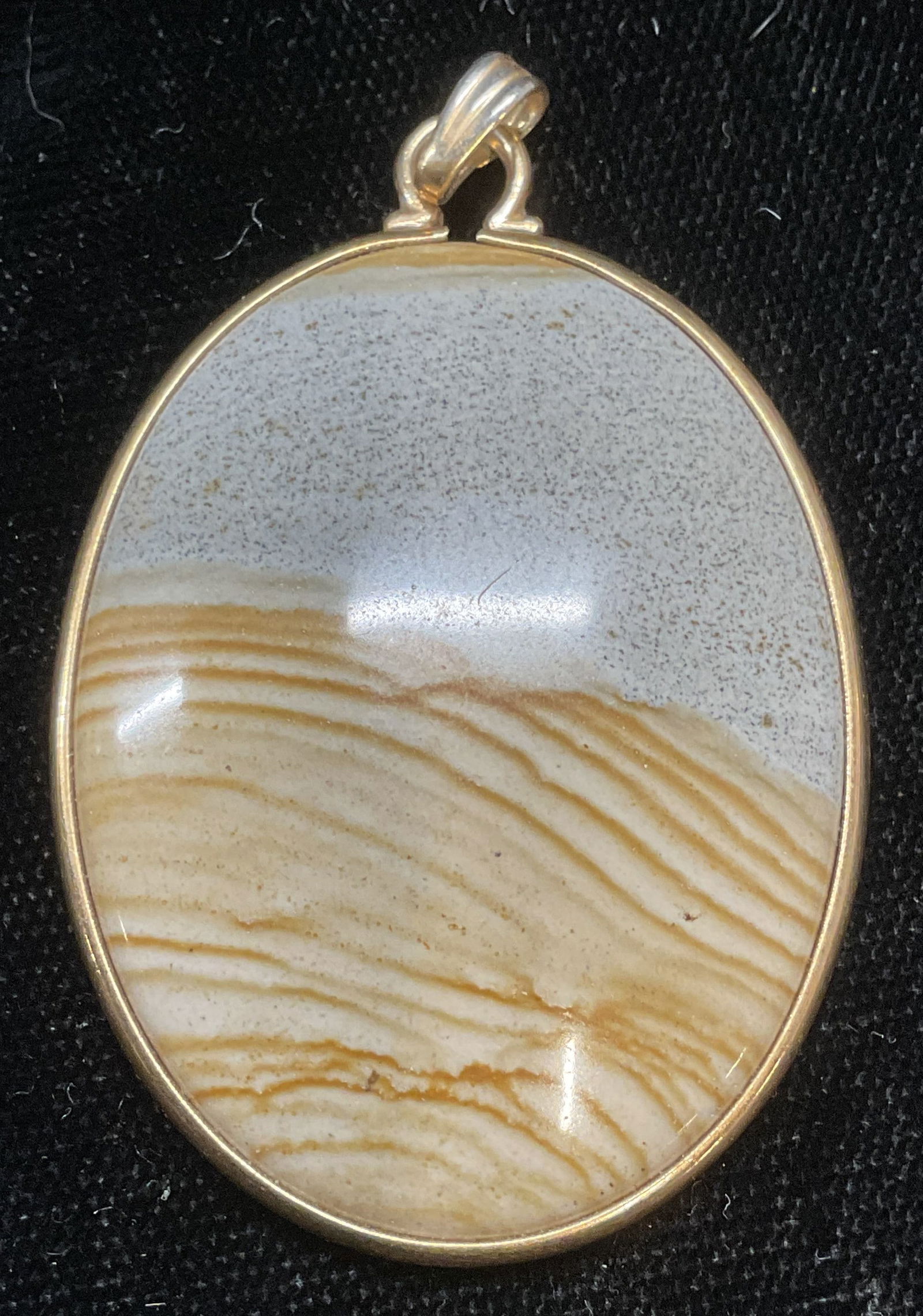 Signed 12k Gold Filled Agate Pendant: Signed tan and grey agate pendant with 12k gold filled setting. Signed on bail illegibly. Measures approx 1.5 x 1.25 inches. Some wear including scratching observed. Jewelry, estate jewelry, costume j