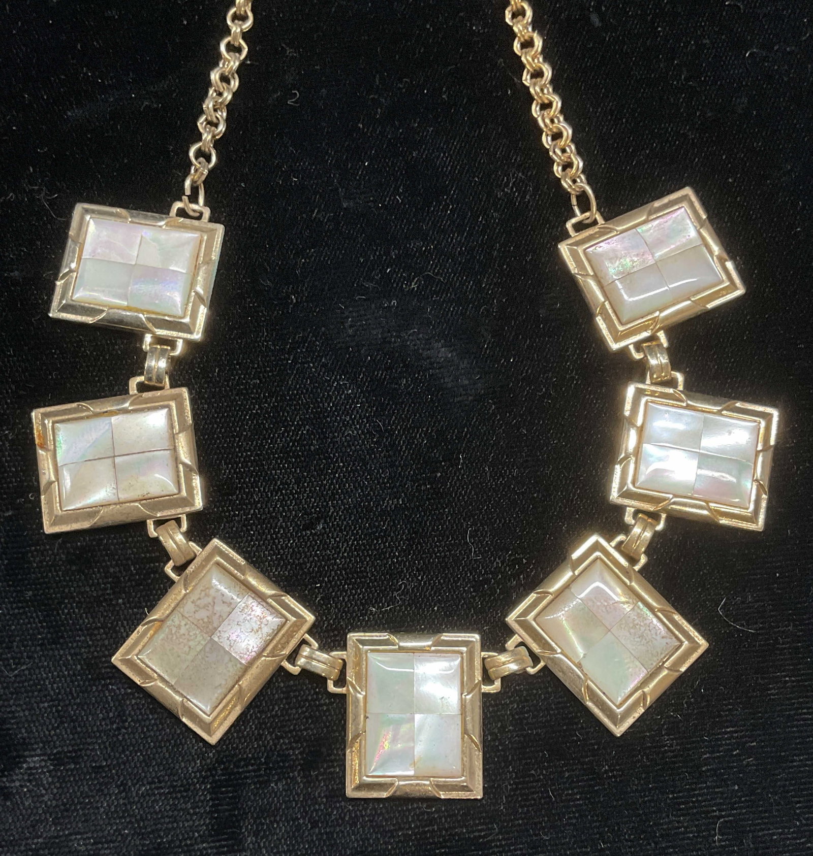 Vintage Gold Tone Mother of Pearl Choker Necklace: Vintage gold tone choker necklace with mother of pearl decorated pendants. Drop length approx 7 inches. Some wear including scratching observed. Jewelry, estate jewelry, costume jewelry, cocktail jewe