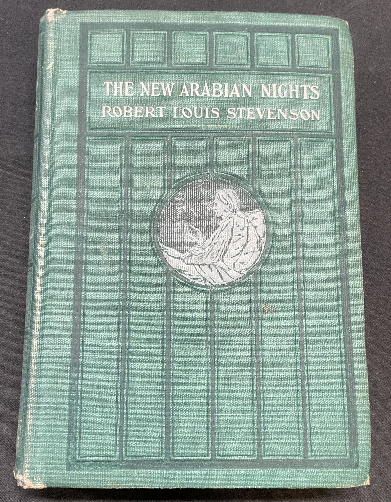 1906 New Arabian Nights, Robert L Stevenson: Antique hardcover copy of The New Arabian Nights by Robert Louis Stevenson. Published by Current Literature Publishing, 1906. Measures approx 6.5 x 4.25 inches. Some wear to cover, pages, and binding 