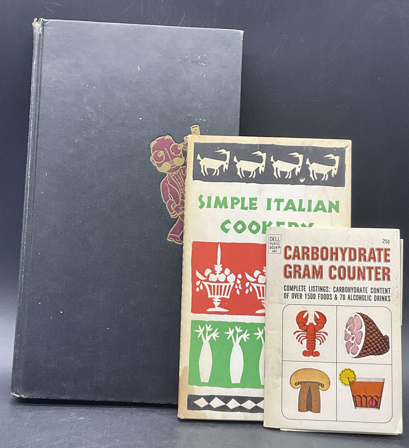 Lot 3 Vintage Host / Cook / Calorie Books, Ilstr +: Three vintage books revolving around cooking, hosting, or calorie counting. Some books contain illustrations. Hardcover and paperback. Largest book, ESQUIRES HANDBOOK FOR HOSTS C. 1953, measures appro
