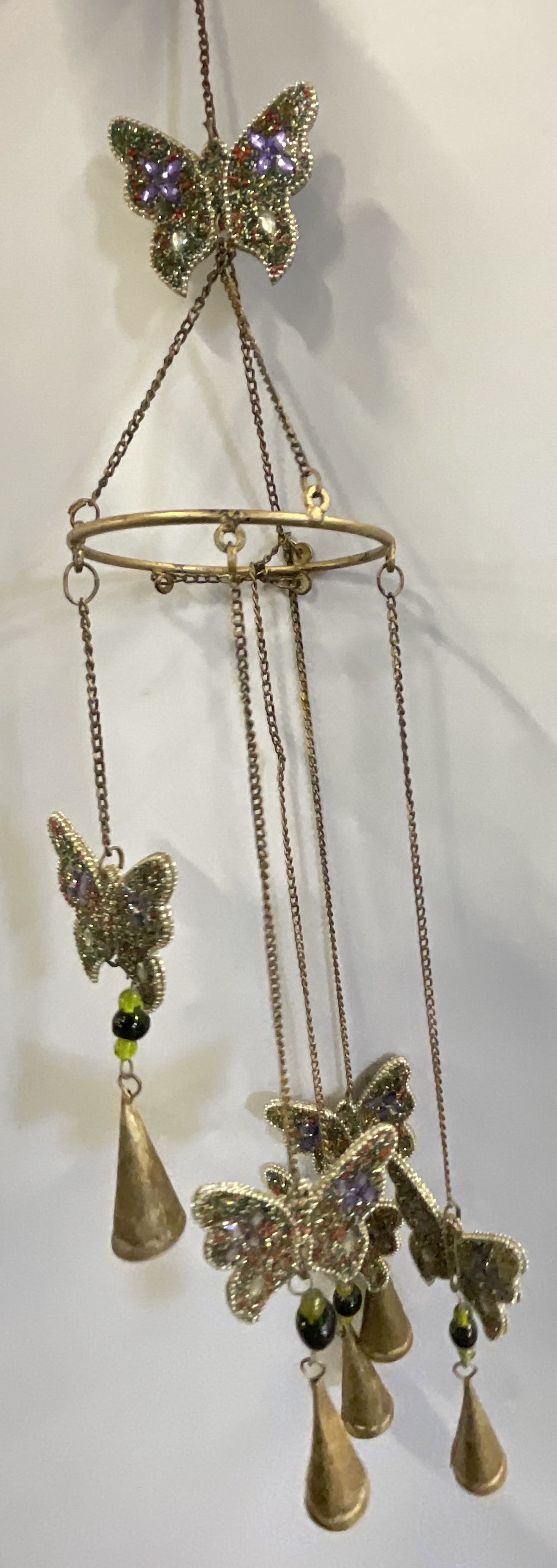 Metal Beaded Butterfly Motif Wind Chime: Metal Beaded Butterfly Motif Wind Chime. Drop length approx. 35 inches. Shedding to material. Discoloration, surface wear, and residue present. home decor, home accents, homewares, housewares, home ac