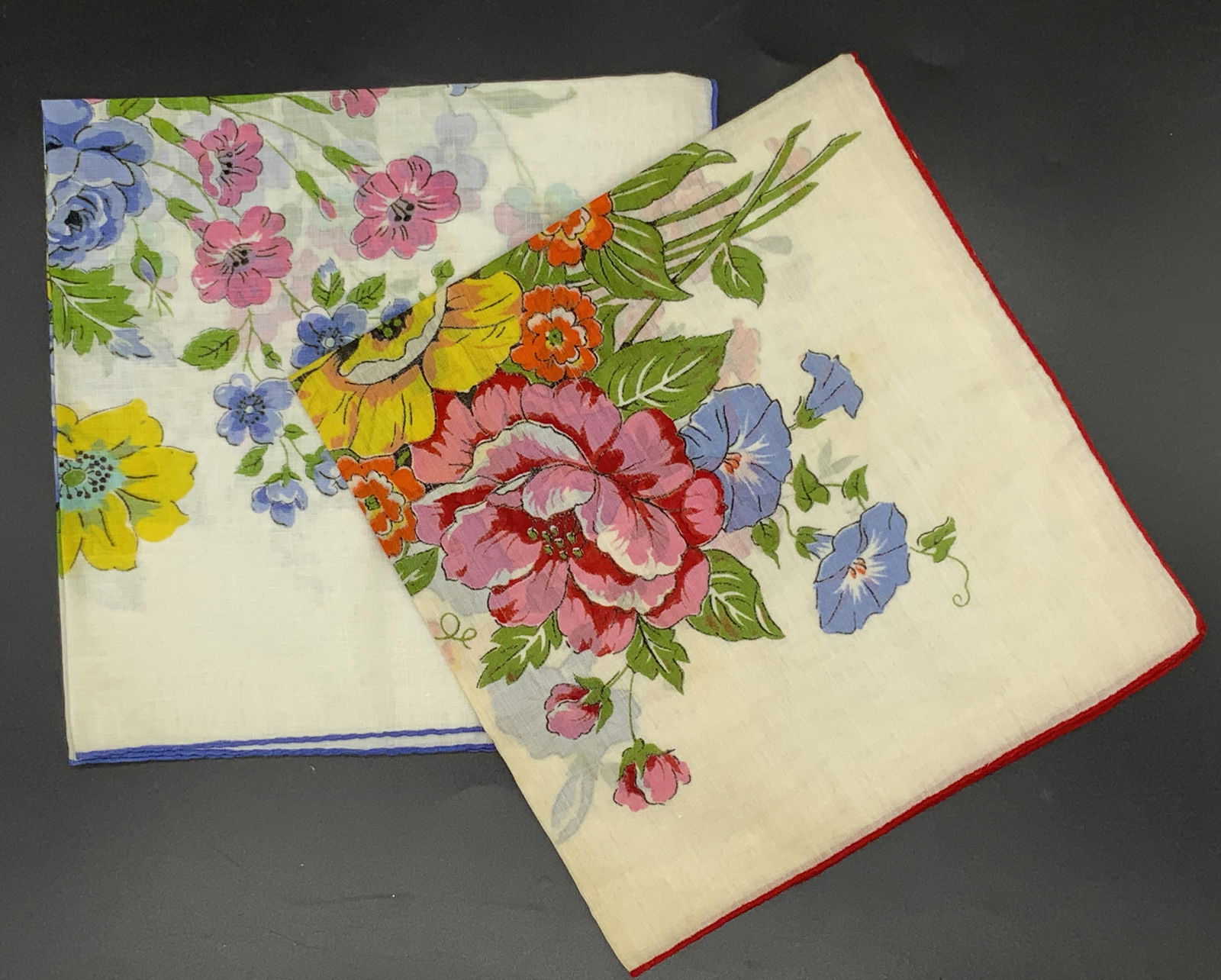 LOT 2 Floral Handkerchiefs: Fabric, unknown, unlabeled. Floral motifs. Measures approx 14 1/2 in square. Evident discoloration and wear. Fashion, wearable, hankie, handkerchiefs. 4SB