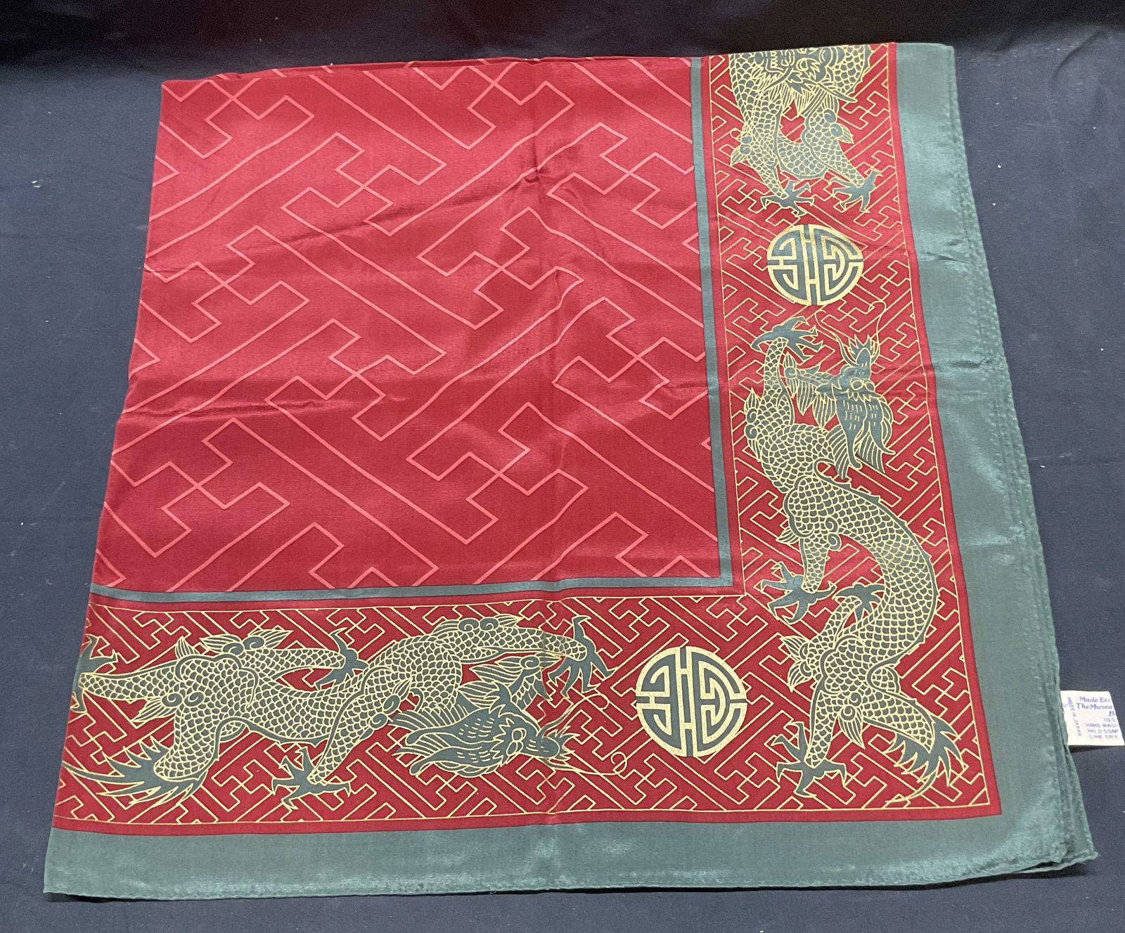 Vtg MFA Boston Red Green Silk Dragon Scarf: Vintage Museum of Fine Arts Boston silk scarf. Red, green, and gold Asian print with dragon border. Measures approx 36 x 36 inches. Some wear consistent with exposure. Museum of fine art Boston, MFA s