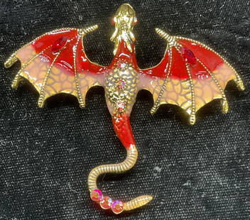 Gold Tn Enamel Crystal Dragon Brooch Pendant: Gold tone red enamel and crystal decorated dragon motif brooch/pendant. Hinge pin and bail on underside. Measures approx. 2.25 x 2.75 inches. Some surface wear including scratching observed.