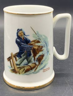 C.1984 Norman Rockwell Museum The Seafarers Mug: A white ceramic mug featuring The Seafarers by Norman Rockwell. Reverse reads The Seafarers by Norman Rockwell. Underside reads The Seafarers Tankard Collection, Braving The Storm, Norman