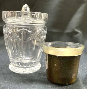 Lot 2 Crystal Vessel W Lid & Candle Holder: Candle holder has silver plated sleeve. Candle holder is glass. Larger vessel is crystal piece includes lid. Vessel measures approximately 4 inches tall 3.25 inches wide. Candle holder, vessel,