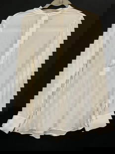 POLO RALPH LAUREN Sheer White Buttoned Blouse: POLO RALPH LAUREN Sheer White Buttoned Blouse. Long sleeves. Material tag reads 100% Silk. Brand tag reads POLO RALPH LAUREN. Size tag reads M. Loose threads, discoloration, and surface wear