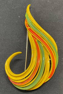 Vintage Yellow Orange Enameled Swirl Brooch: Vintage yellow, orange, and green enameled swirl brooch. Hinge pin on underside. Measures approx. 3 x 1.75 inches. Some surface wear including scratching observed. Jewelry, estate jewelry, costume