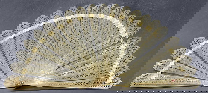 Antique Pierced Celluloid & Ribbon Handheld Fan: Antique, possibly vintage, Pierced Celluloid & Ribbon Handheld Fan. Closed measures approx. 6.5L x 1W in. Surface wear, discoloration, and losses present. Hand fan, handheld fan, Wearables,