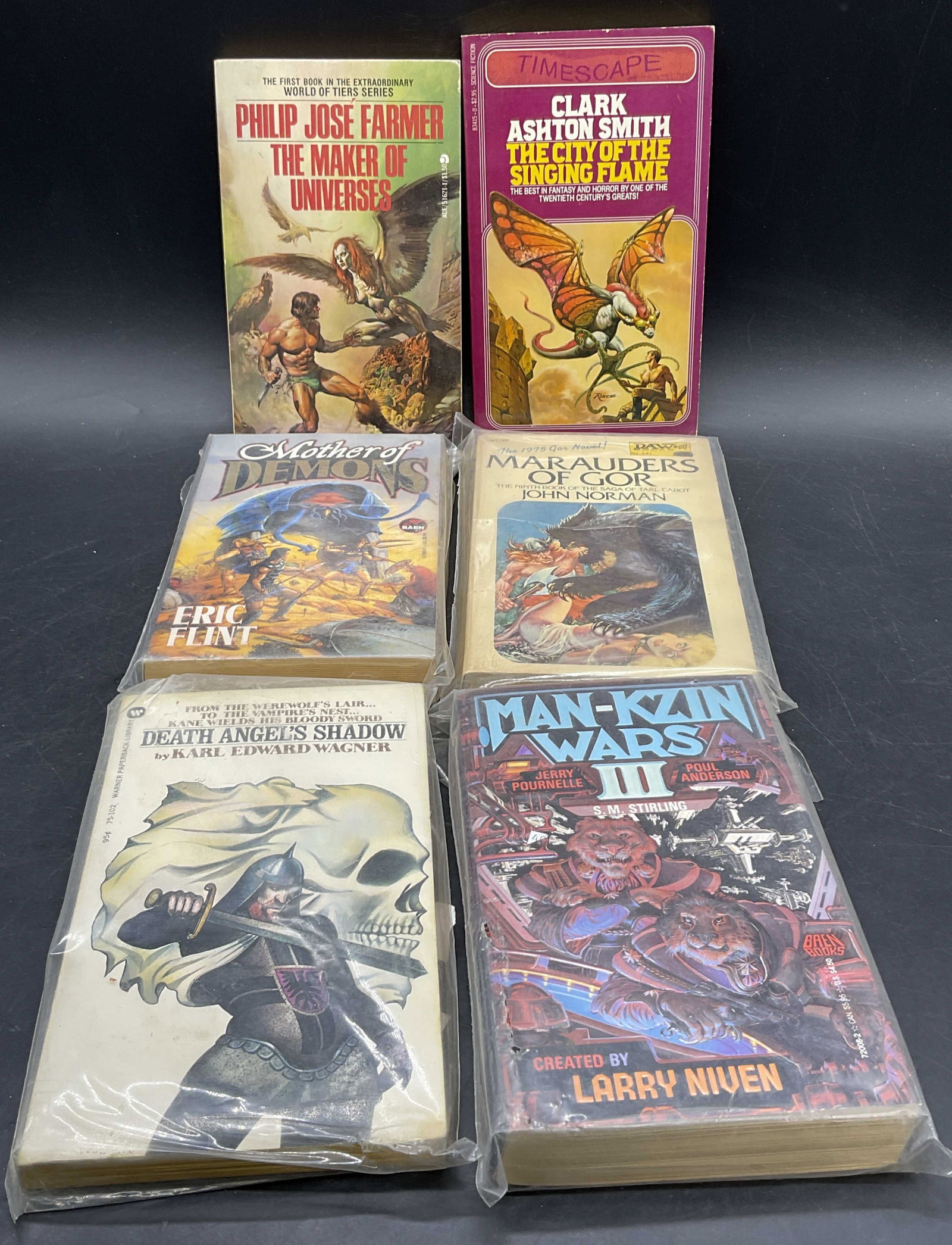 Lot6 Vintage Science Fiction Paperback Books 1965+: Lot 6 Vintage Science Fiction Paperback Books. Four books contained in plastic packaging, not examined out of packaging. Lot includes THE MAKER OF UNIVERSES by Philip Jose Farmer, C 1965 ACE Books. Cl