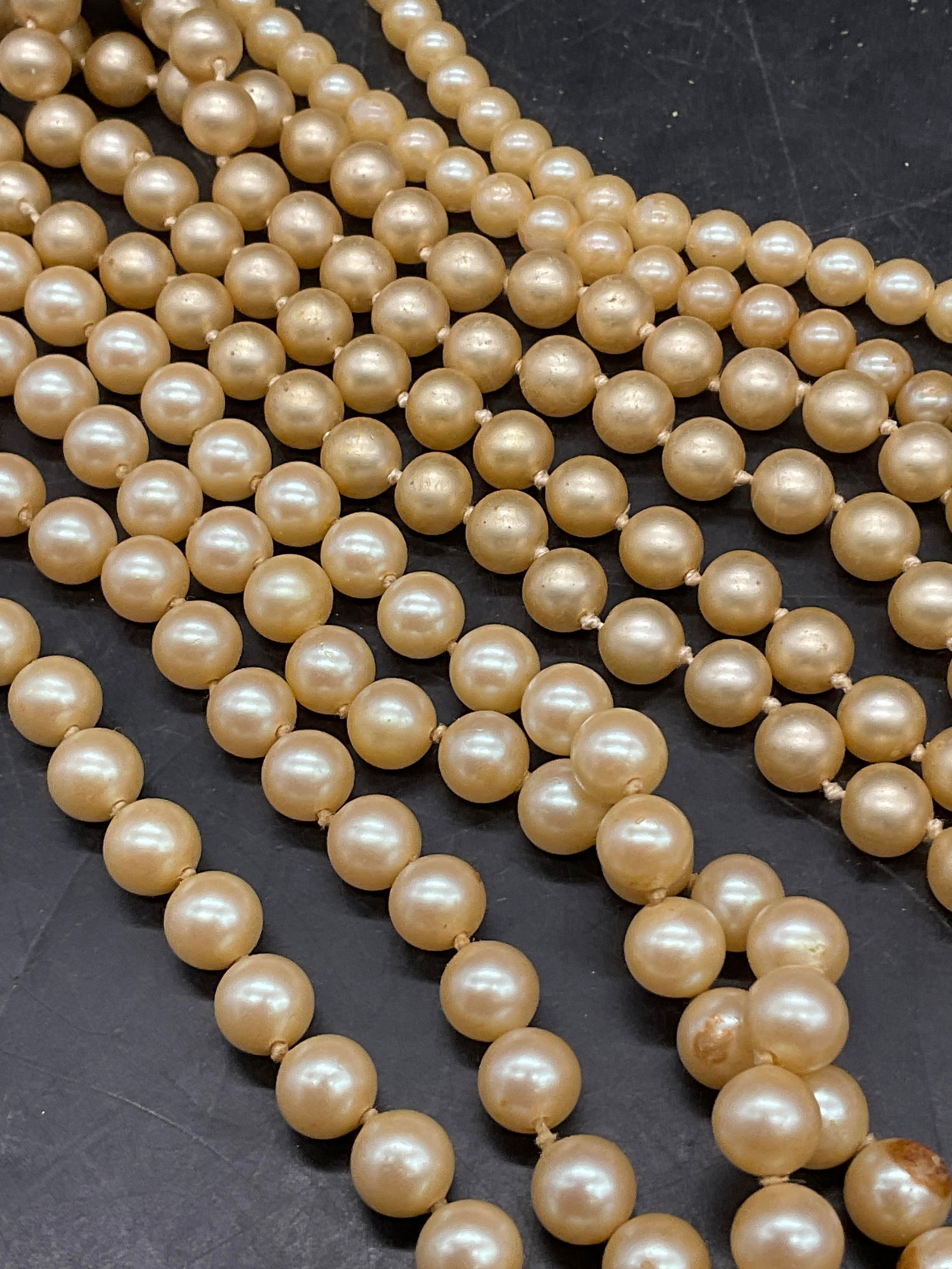 Lot 3 Vintage Pearlescent Beaded Necklaces: Lot 3 Vintage Pearlescent Beaded Necklaces. Double strand pearlescent beaded bejeweled clasp necklace measures approx. 26 inches in length. Measured end to end. Some clasps need repair. Shedding, miss