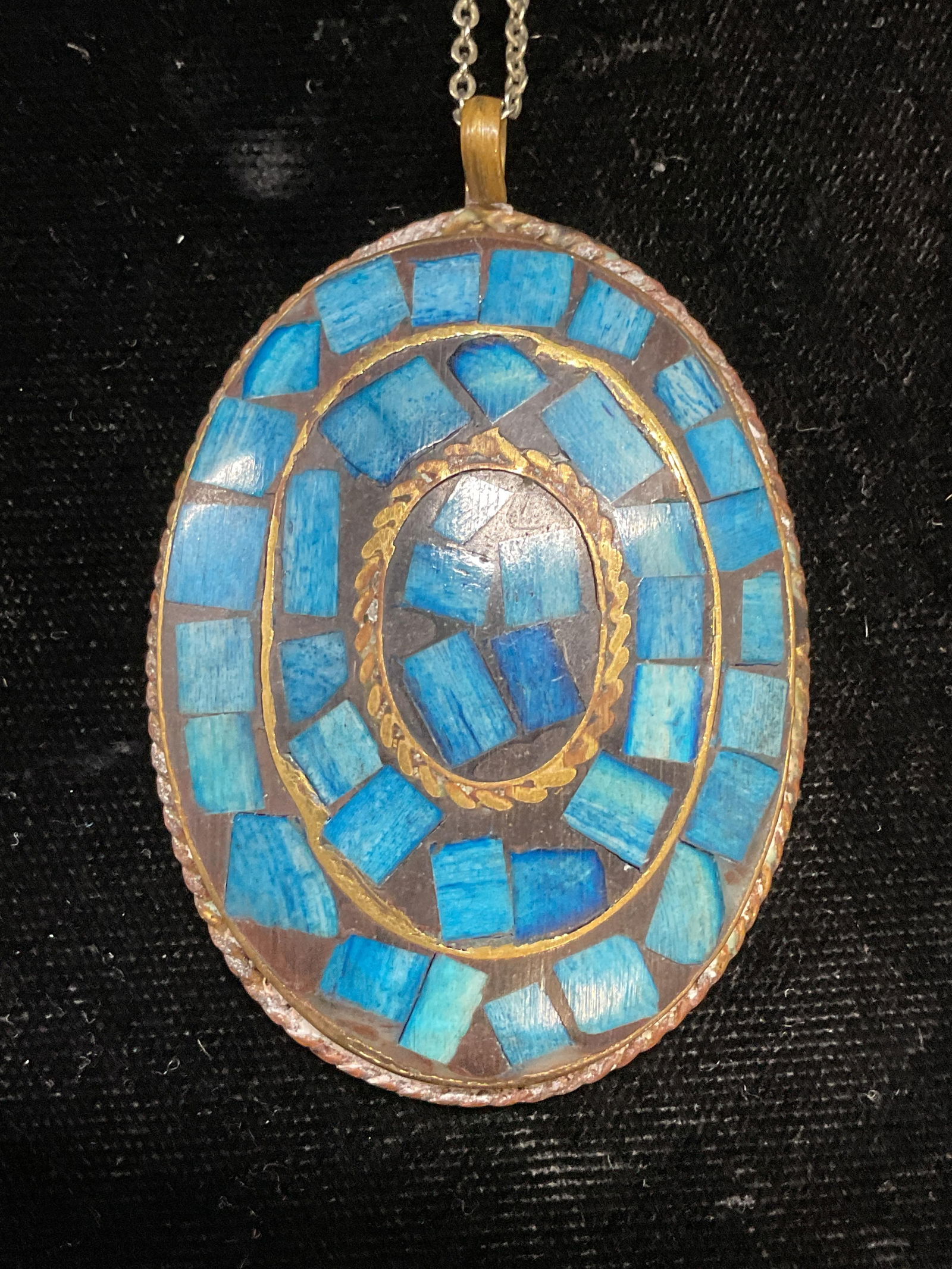 Vintage Brass Dyed Bone Pendant Necklace: Vintage pendant necklace on chain. Brass pendant with inlaid dyed blue bone. Pendant measures approx 2 x 1.5 inches. Necklace drop length approx 9 inches. Some wear including scratching. Jewelry, esta