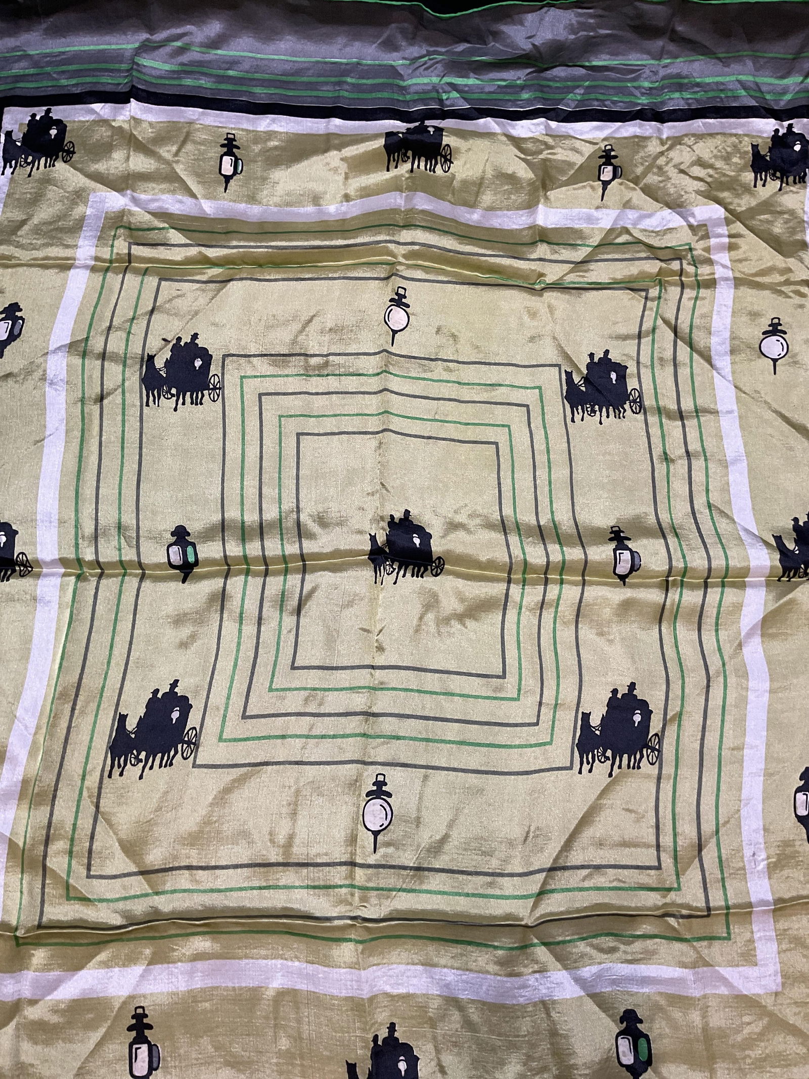 Vintage Horse & Carriage Print Green Silk Scarf: Vintage green and grey silk scarf with horse, carriage, and street lantern print. Measures approx 31 x 34 inches. Some wear including blemishes and tearing observed. Scarf, vintage scarf, silk scarf,