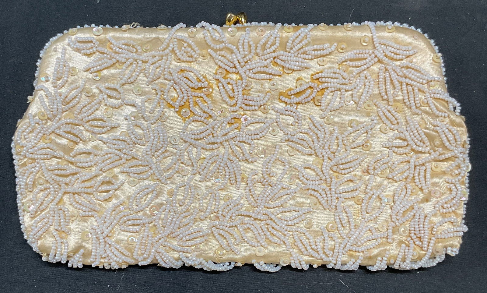 Vtg Stylecraft White Beaded Clutch Evening Bag: Vintage Stylecraft Miami white satin beaded evening handbag/clutch. Signed on label. Measures approx 4.75 x 9 inches. Some losses and blemishes observed. Stylecraft, beaded handbag, satin handbag, whi