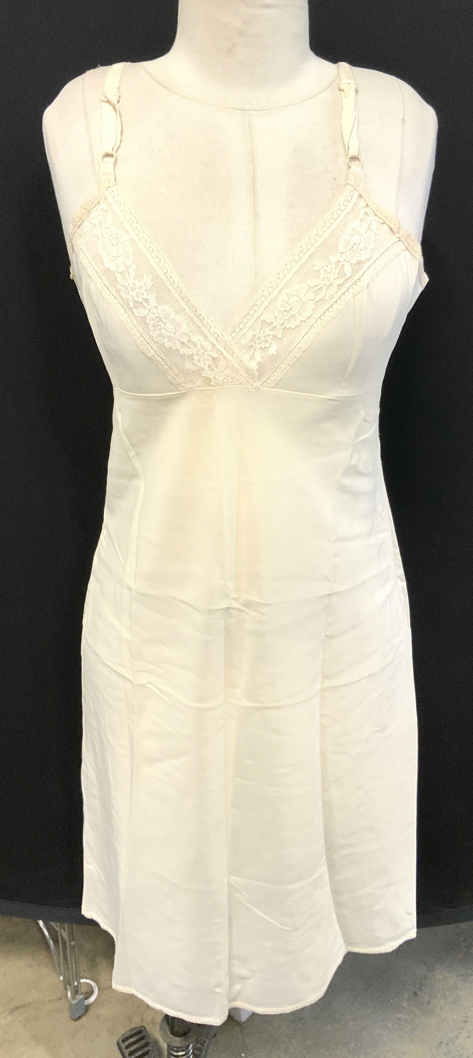 Cream Slip Dress Nightgown W Floral Lace: Slip dress is cream toned. Piece has floral lace detail. Piece measures approximately 39 inches tall from strap to base. Appears to be size Med-Lrg (No apparent tags). Loungewear, nightgown, nightwear