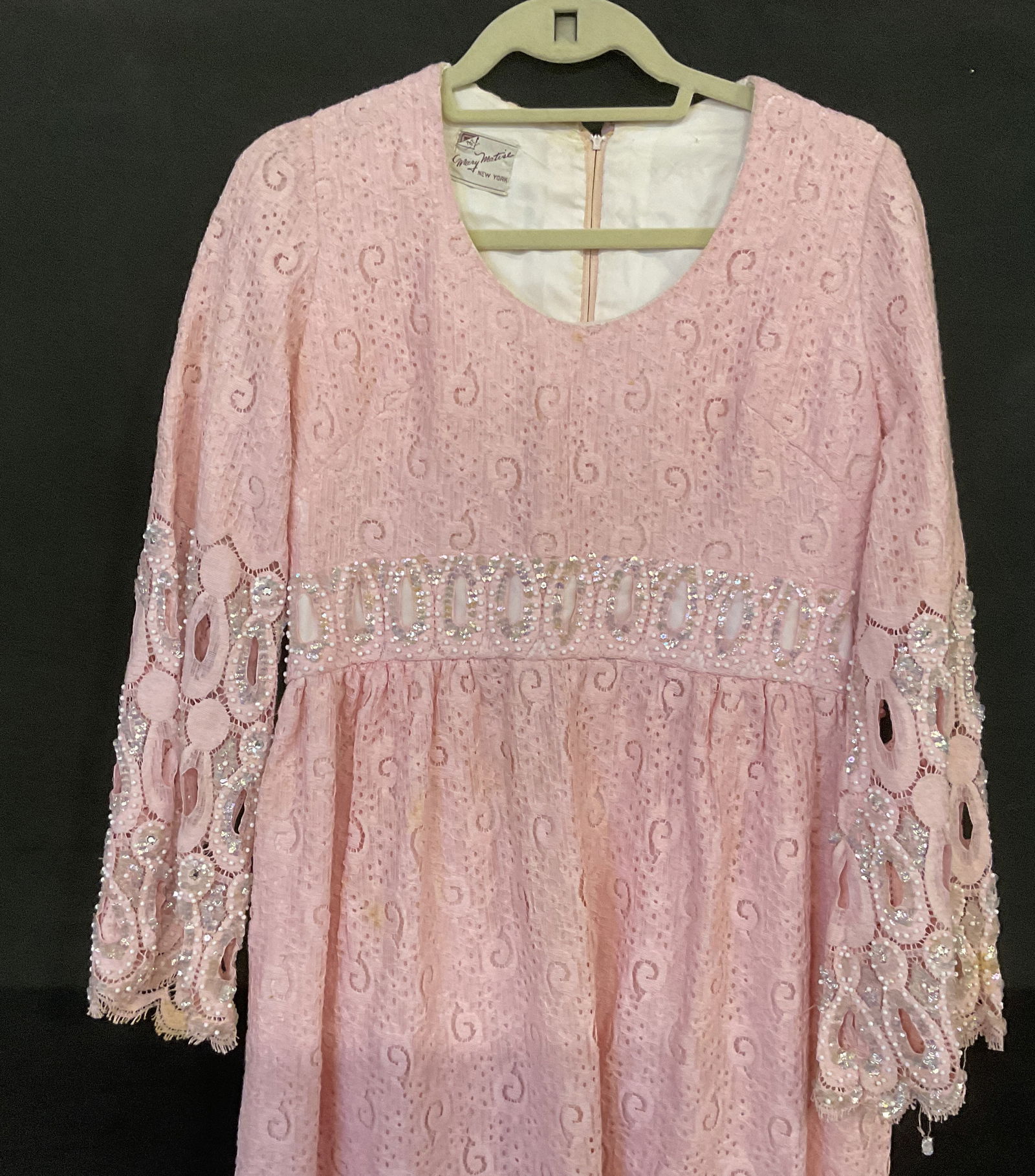 MARY MATISE NY Vintage Beaded Pink Lace Dress: MARY MATISE Vintage Beaded Pink Lace Dress. Brand tag reads MARY MATISE NEW YORK. No material or size tag. Possibly synthetic material. Measured flat approx. 53 inches in length. Measured across chest