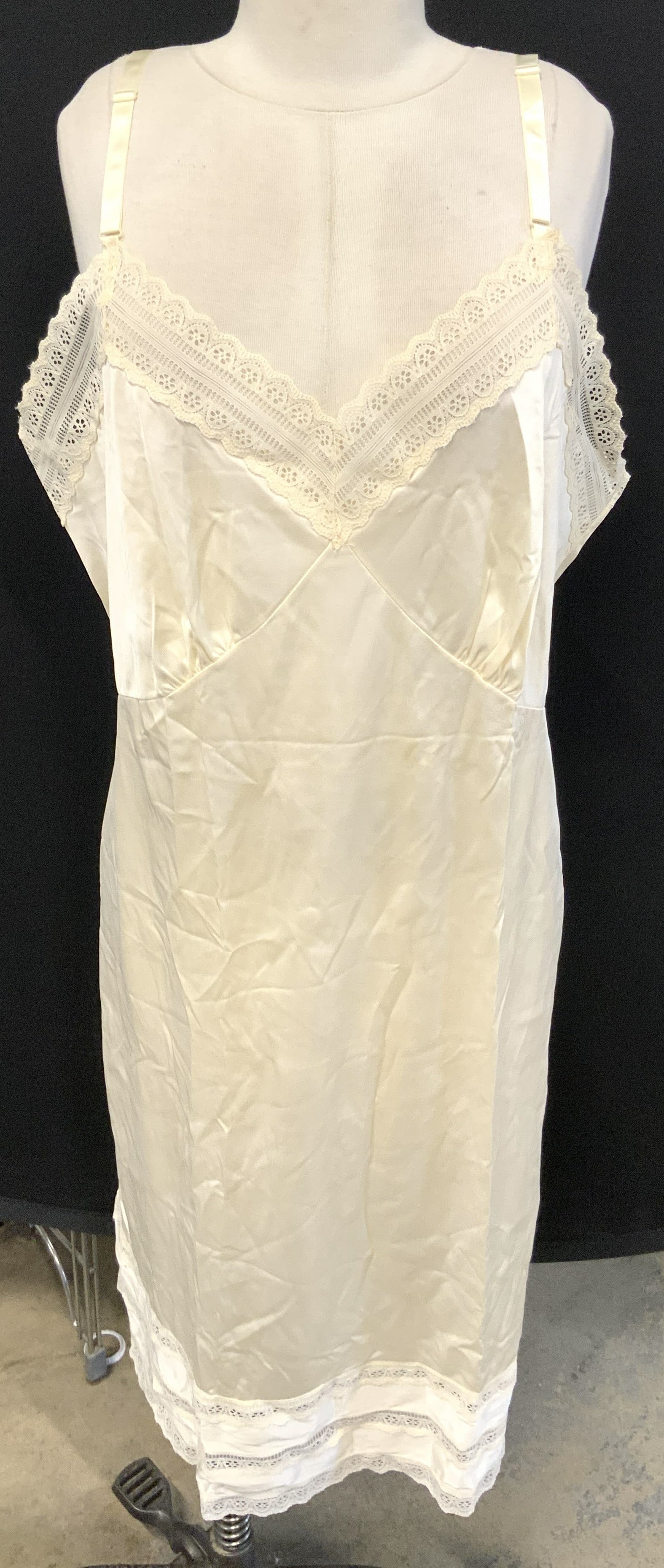 Cream Slip Dress Nightgown W Lace Edges: Slip is cream toned. Piece has lace edges. Nightgown measures approximately 41.5 inches tall from strap to base. Appears to be size XL. Loungewear, nightgown, nightwear, nighty, slip, slip nightgown.
