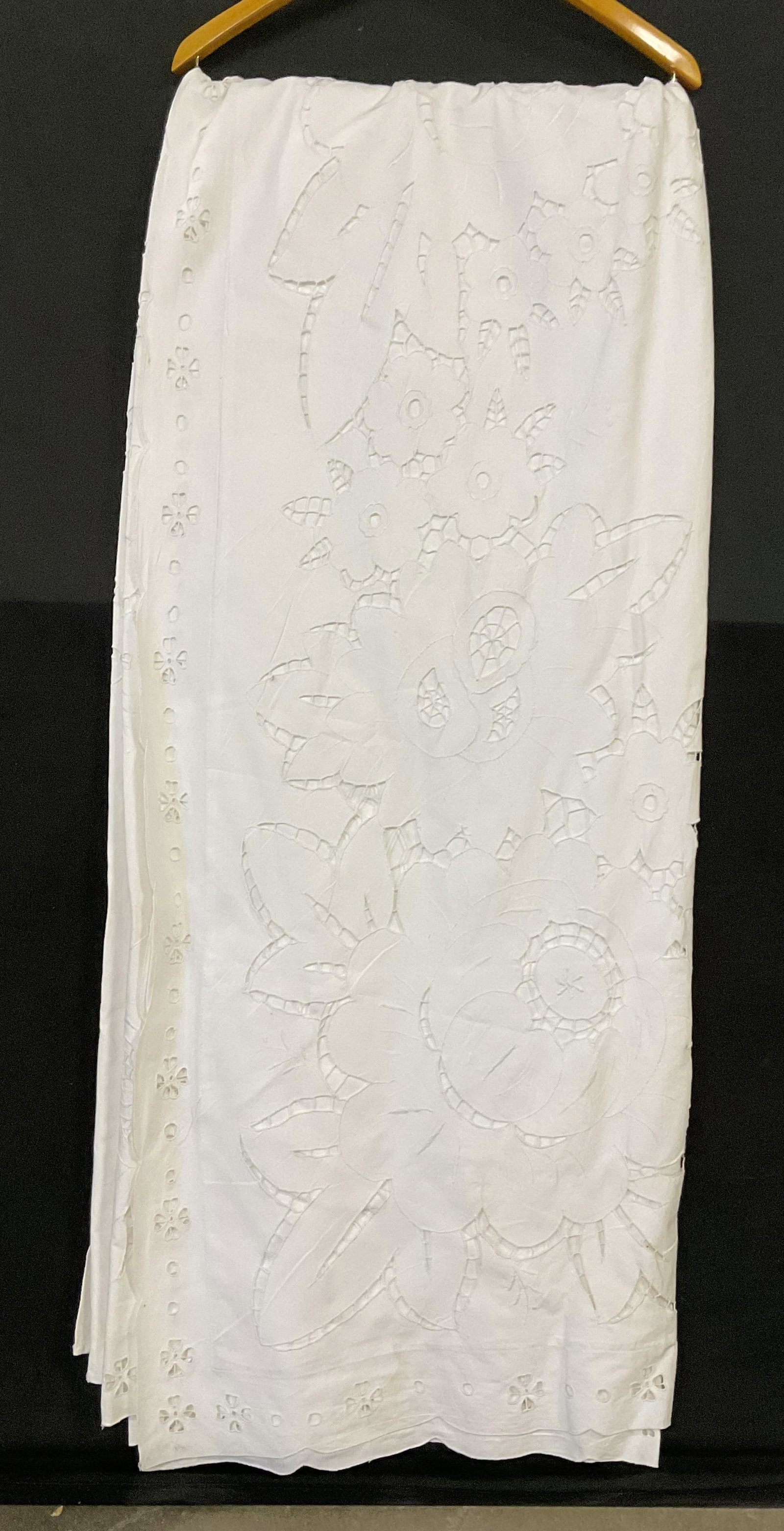 White Floral Motif Fabric Duvet Cover: White Floral Motif Fabric Duvet Cover. Pierced fabric work details. Measures approx. 104L x 86W in. Partially open back. Discoloration, residue, and surface wear present. home decor, home accents, hom