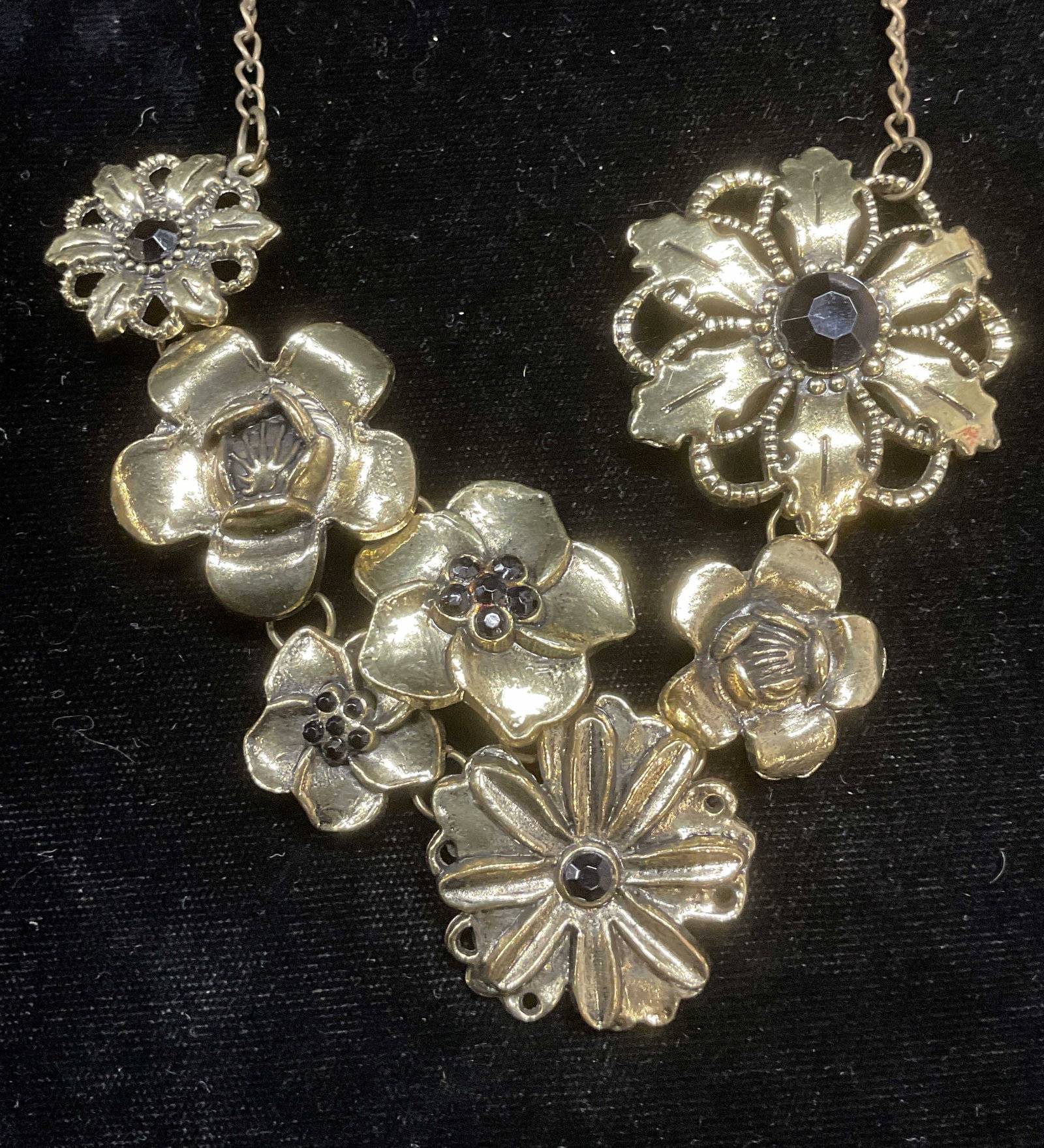 Vintage Gold Tone Flower Pendant Necklace: Vintage gold tone flower pendant necklace with black crystal. Drop length approx 16.5 inches. Some wear including scratching observed. Jewelry, estate jewelry, costume jewelry, cocktail jewelry, fashi
