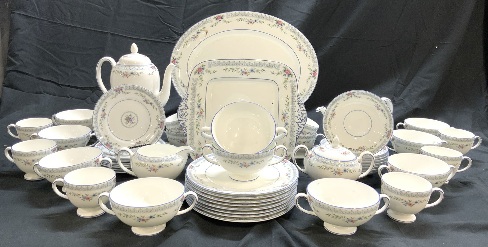 Set 56 WEDGWOOD ROSEDALE China: Undersides of each piece reads WEDGWOOD ROSEDALE MADE IN ENGLAND. Lot includes 10 dessert bowls with handles, 10 teacups, 8 dinner plates, 8 saucers, 8 salad plates, 8 bread plates, 1 teapot with lid,