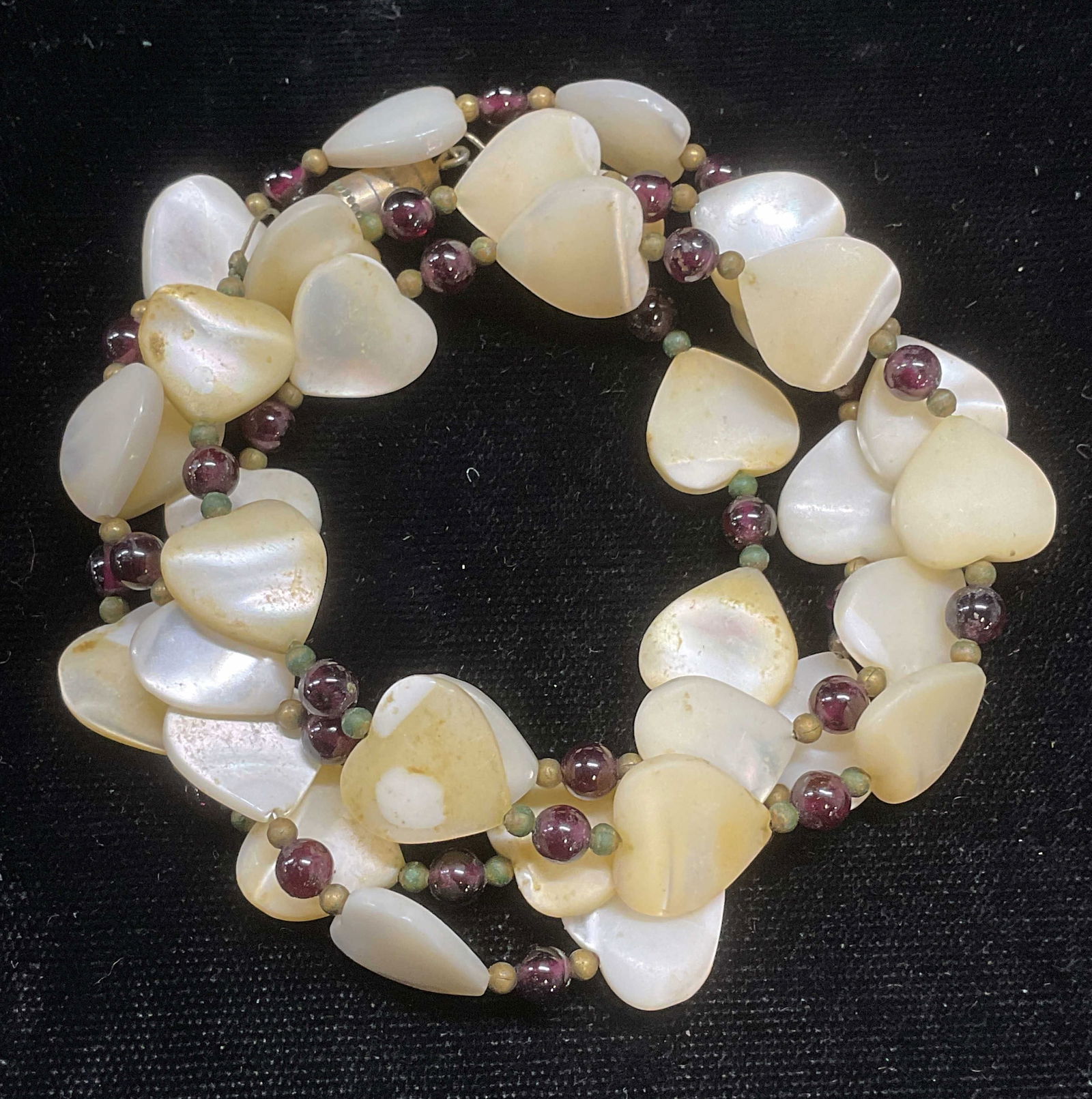 Vintage Mother of Pearl Heart Beaded Necklace: Vintage mother of pearl heart beaded necklace with gold tone accents. Drop length approx 13 inches. Some wear including scratching observed. Jewelry, estate jewelry, costume jewelry, cocktail jewelry,