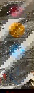 Vintage Red, Yellow, Blue Traffic Light 40.5 In Ht: Vintage Red, Yellow, Blue Traffic Light. Weighty. Raised images / trademarks to the lights. Some verbiage to one light, illegible, possibly reads Trademark Regin U.3. Measures approx. 40.5H x