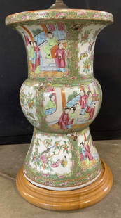 Vintage Hand Painted Asian Porcelain Table Lamp: Vintage Hand Painted Asian Porcelain Table Lamp. Crafted from porcelain, wood, and metal. Figures, birds, florals, and foliage designs to the porcelain. Measures approx. 33H x 9W in. Measurement inclu
