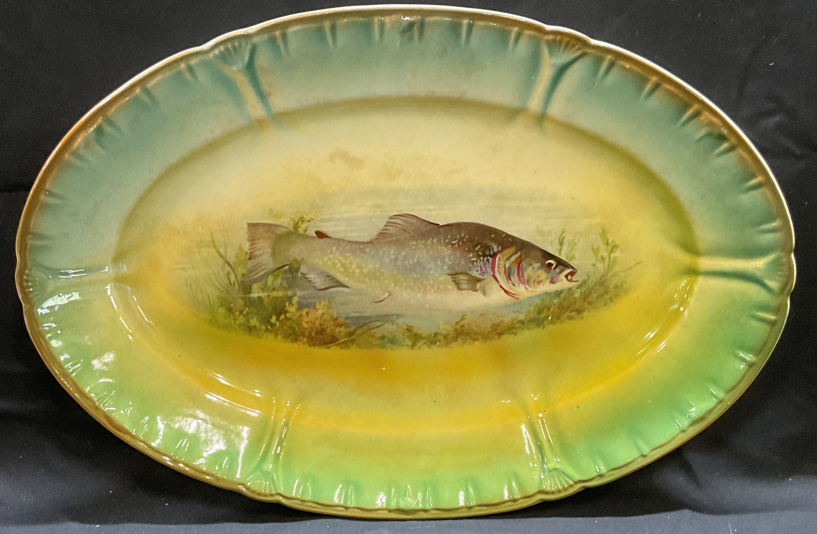 Antq Franz Anton Mehlem Porcelain Fish Platter: Antique Franz Anton Mehlem Bonn porcelain platter. Oval shaped. Fish motif in green. Stamped on underside. Made in Germany. Measures approx 14.5 x 10 inches. Some wear including scratching and crazing