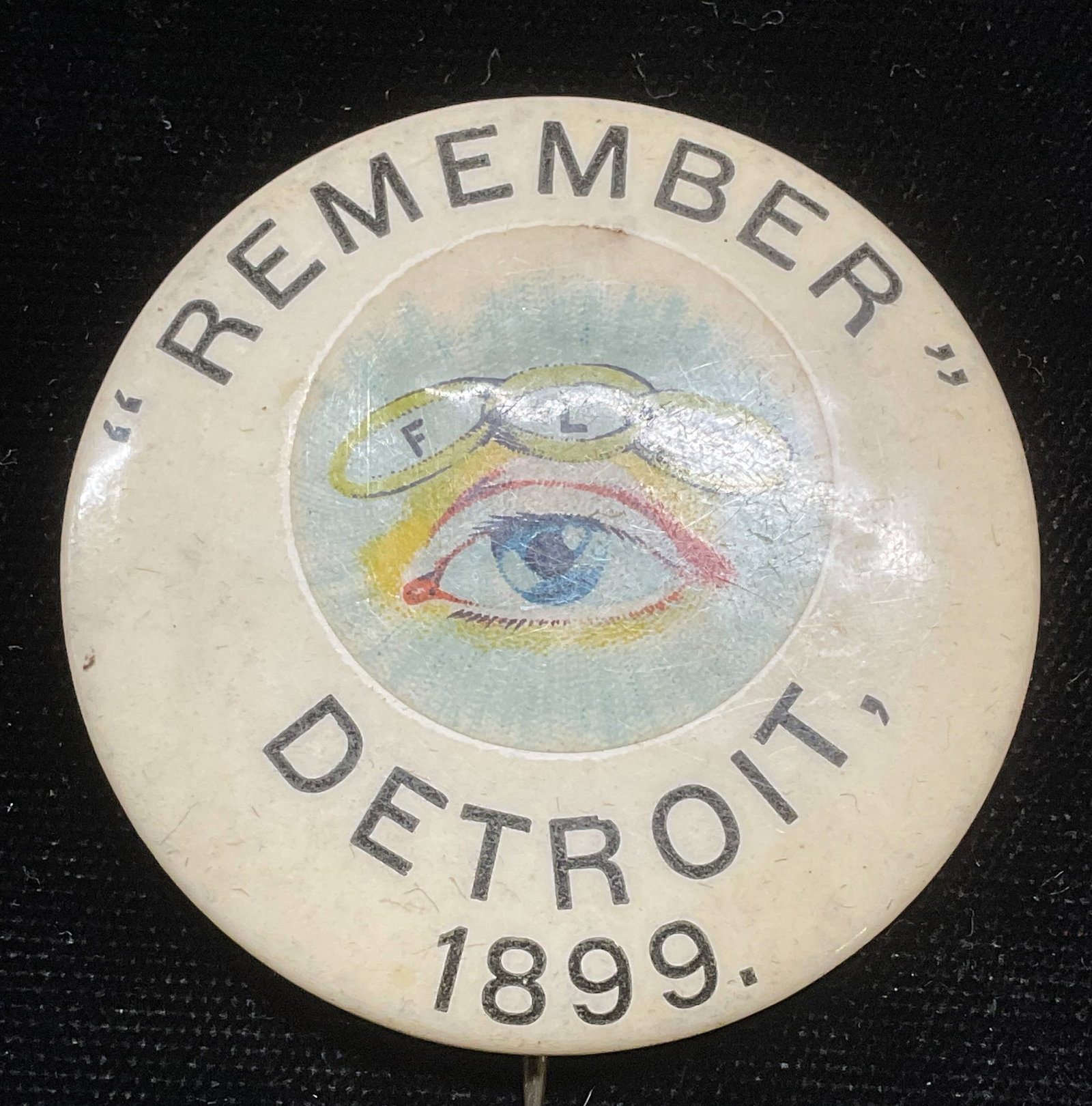 1899 Independent Order Odd Fellows Pin: Antique 1899 Independent Order of Odd Fellows pin. Reads Remember, Detroit, 1899. IOOF symbol, eye with 3 chain links representing Friendship, Love, and truth. Marked on underside made by the Whitehea