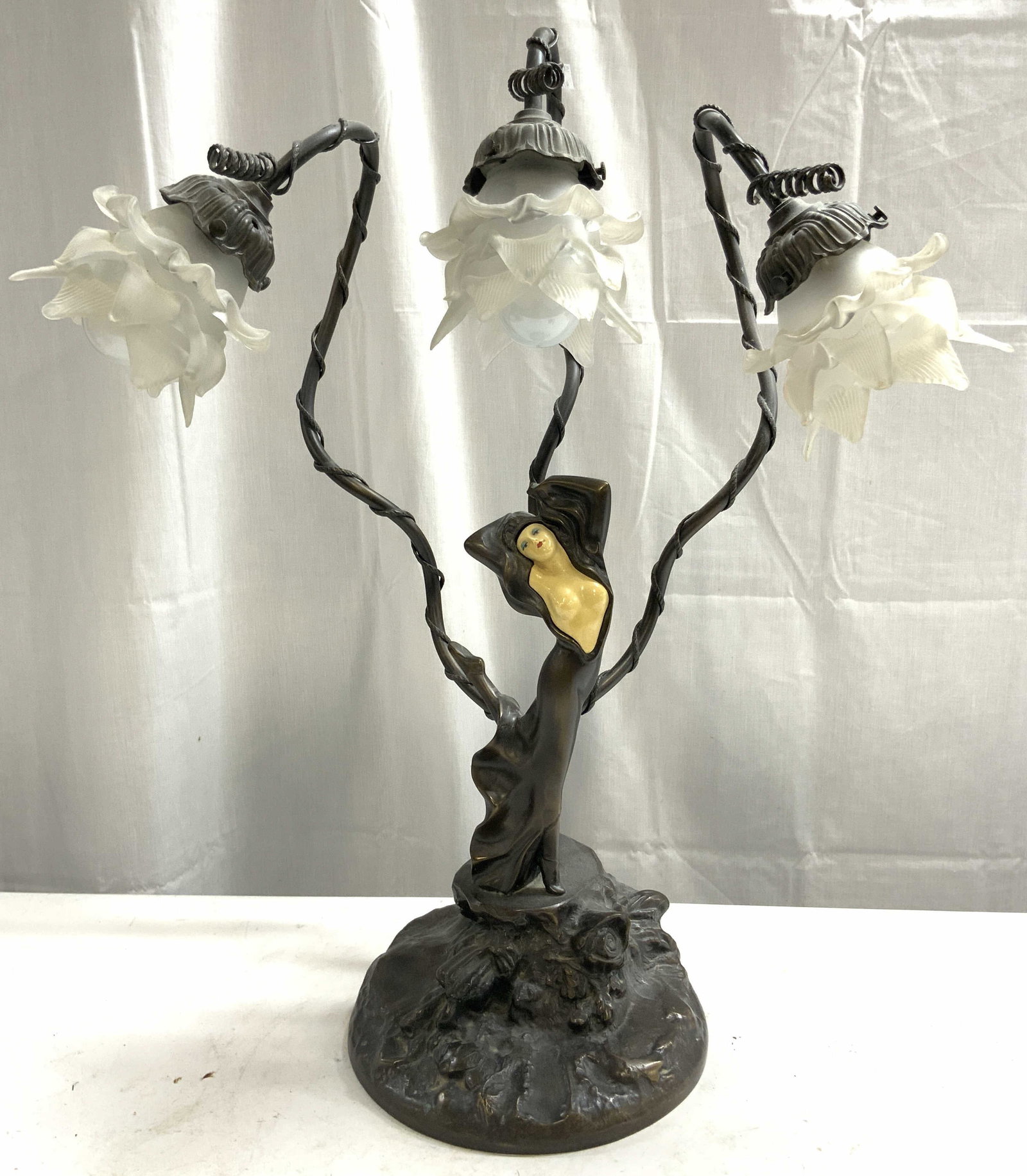 AUGUSTE MOREAU Brnz Part Fem Nude Art Nouv Lamp: Lamp is signed AUGUSTE MOREAU. Lamp has partial nude female figure with one leg up. Lamp is vintage art nouveau. Piece appears to possibly be bronze, possibly gilt metal. Lamp base has areas of floral