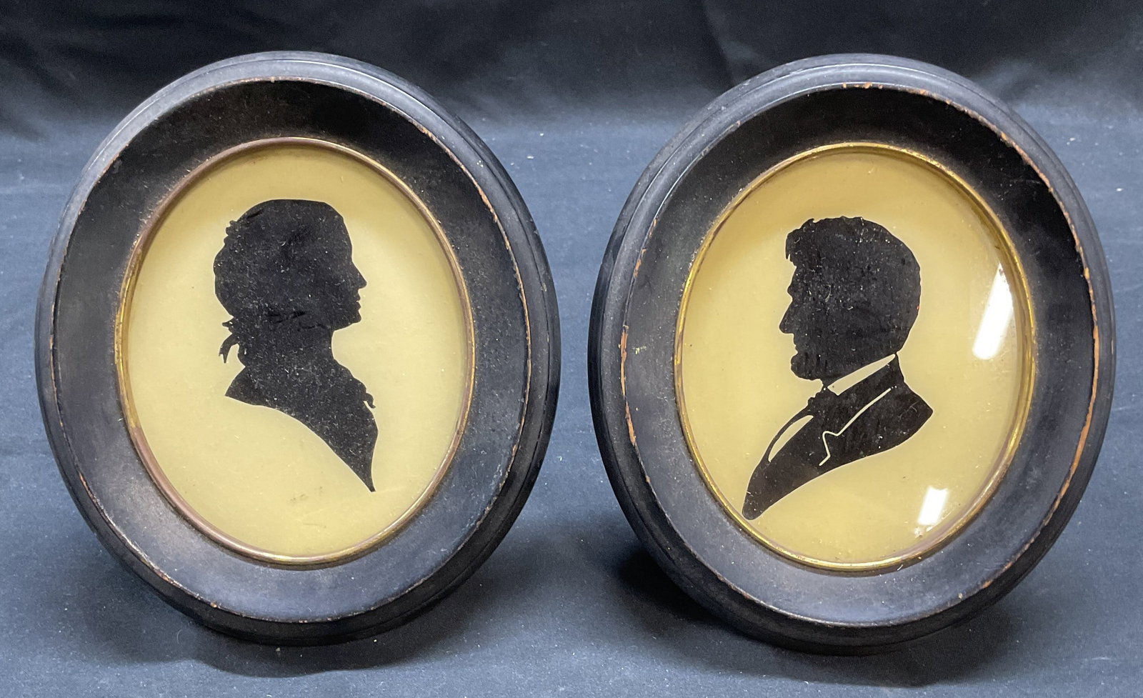 Framed Abraham & Mary Todd Lincoln Silhouettes: Framed pair of Abraham and Mary Todd Lincoln black silhouettes. Round black wood frames with gilt decoration. Not examined out of frames. Frames signed Richards, made in Germany. Frames measure approx