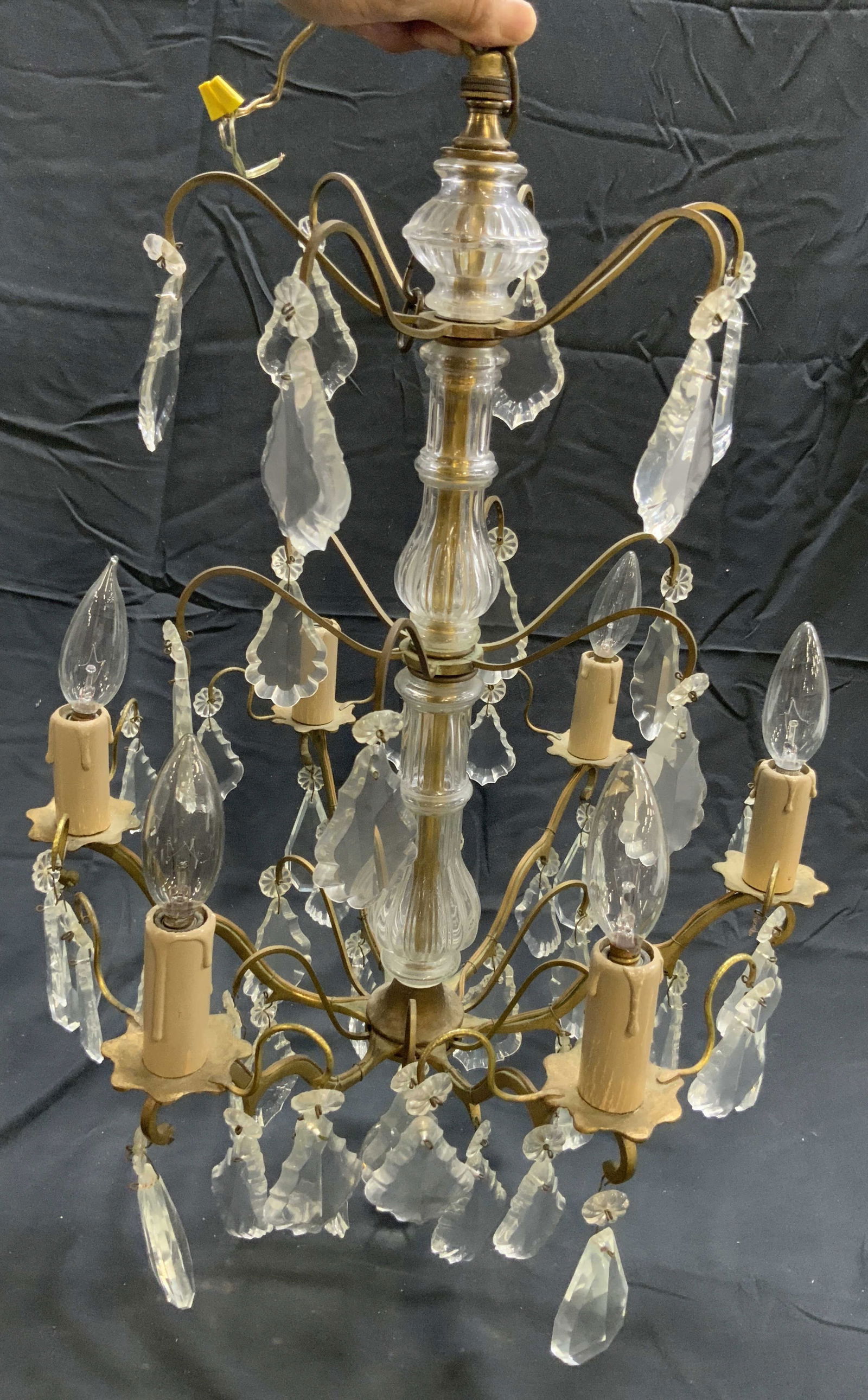 Antq French Brass & Crystal Girandole Chandelier: Girandole Chandelier appears to be antique possibly vintage. Piece is gilt metal with numerous ornaments which appear to be Crystal possibly glass. Chandelier has 6 arms. Each with candlestick style b