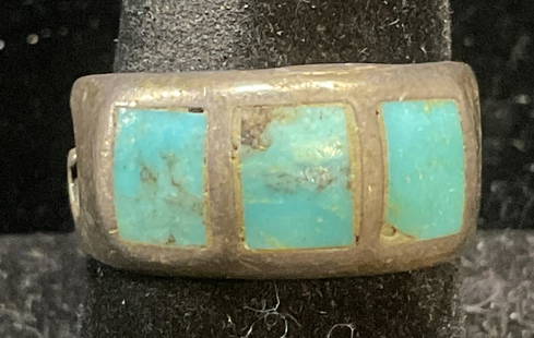 Vintage Silver Turquoise Inlaid Stone Ring: Vintage silver ring with inlaid turquoise stones on band and recessed decoration on sides. Ring size 8. Total weight 7.2 grams. Tests for presence of silver, purity unknown. Possibly sterling. Some we