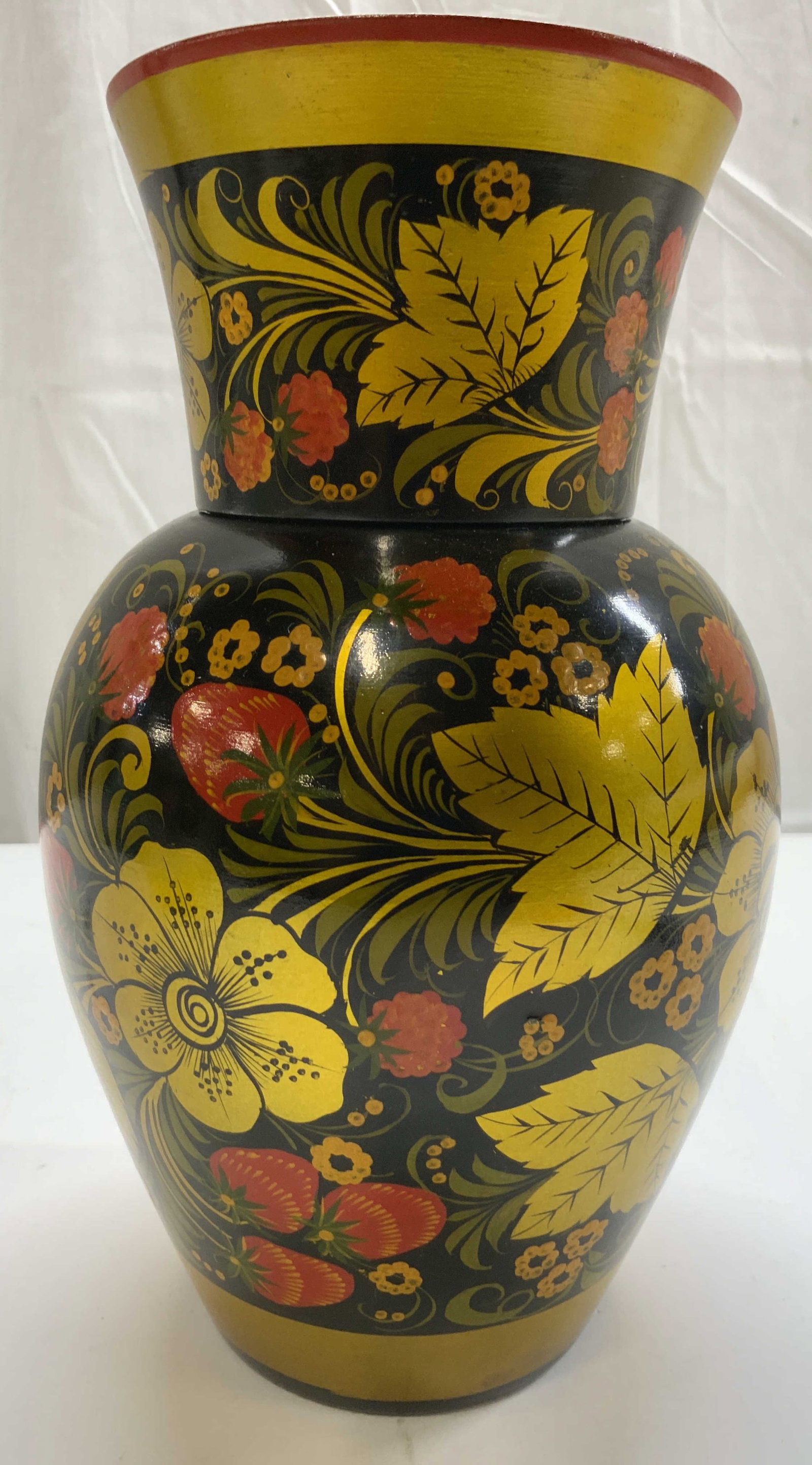 Vintage Lacquered Russian Khokhloma Vase Vessel: Tag on underside has Russian characters Vase is vintage. Piece appears to be lacquered wood. Vase has intricate multi toned floral, leaf & vine detail. interior is gilt, rim is red toned. Piece measur