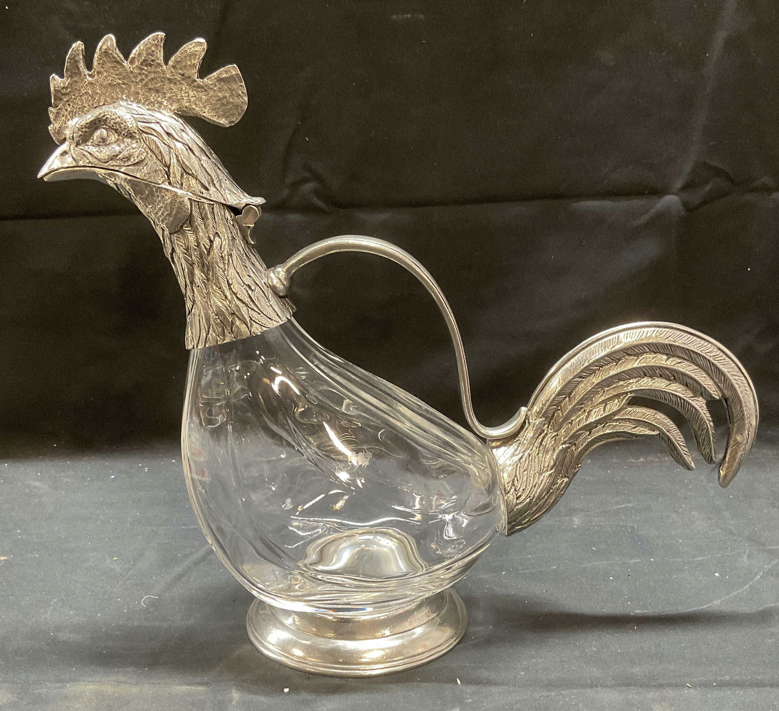 Arte Italica Pewter & Glass Rooster Decanter,: Arte Italica rooster motif decanter pitcher. Pewter with blown glass. Signed on underside. Made in Italy. Measures approx 12.5 x 4 x 11 inches. Some wear consistent with exposure. Arte Italica, arte I