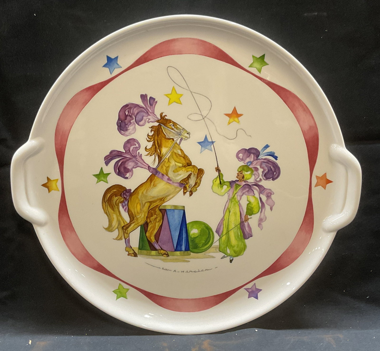 VILLEROY & BOCH Le Cirque Porcelain Platter: VILLEROY & BOCH porcelain platter. Round shape with handles. Le Cirque pattern. Circus horse and performer motif. Signed on underside. Measures approx 11.5 inches wide. Some wear consistent with expos