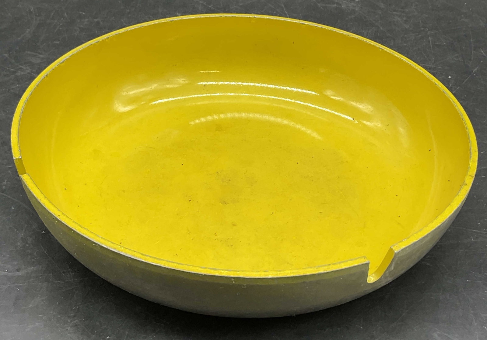 LOUMAC SUPPLY CO. Vntg Yellow Metal Trinket Dish: LOUMAC SUPPLY CO. Vintage Yellow Metal Trinket Dish / Ashtray. Underside signed LOUMAC SUPPLY CO. NEW YORK NY. Yellow obverse and silver tone metal reverse. Measures approx. 1.25H x 6W in. Discolorati