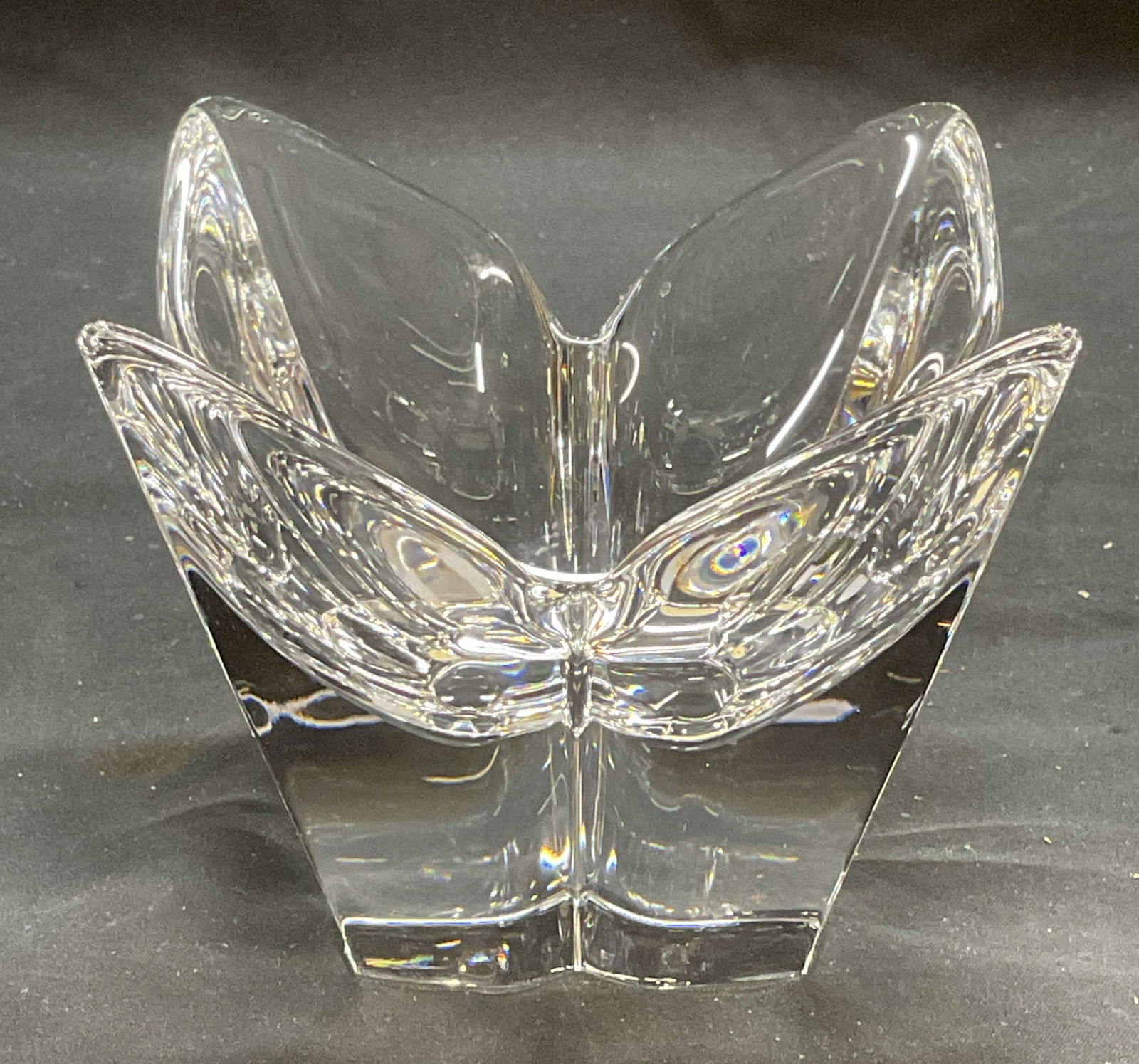 ORREFORS Sweden Crystal Lotus Bowl: ORREFORS Sweden crystal lotus bowl. Flower shape with petal rim. Signed on underside. Measures approx 4.25 x 4.25 x 3.75 inches. Thick walled crystal, piece has weight. Some scratching observed. ORREF