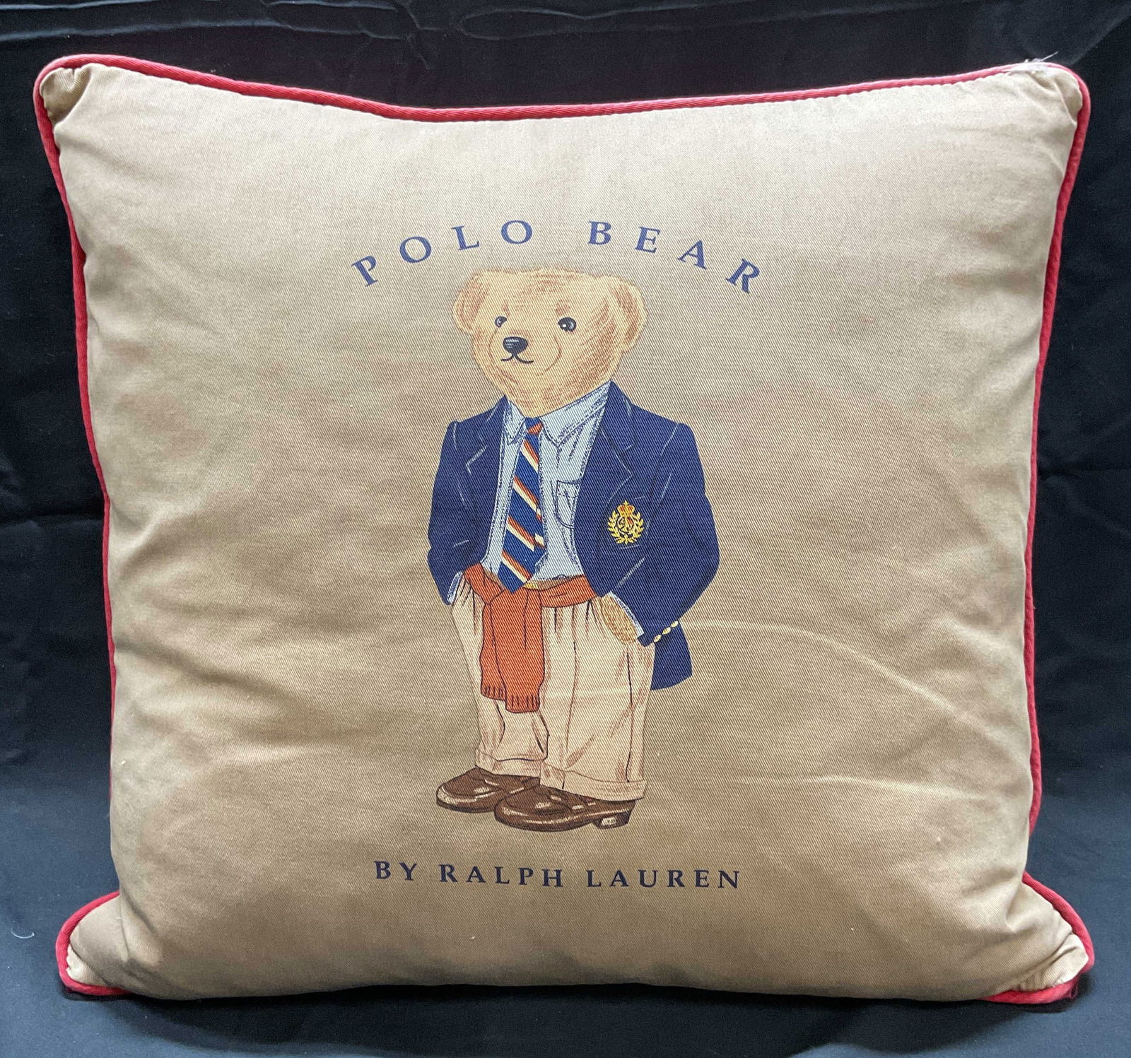 Ralph Lauren Polo Bear Down Pillow: Ralph Lauren Polo Bear graphic print cotton pillowcase in tan and red with down feather pillow. Measures approx. 17 x 17 inches. Some wear including blemishes and discoloration observed. Ralph Lauren,