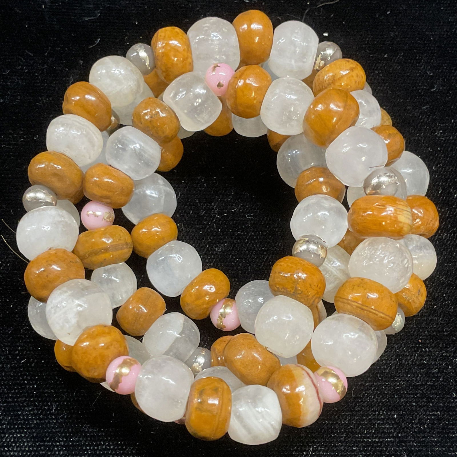 Vintage Glass Beaded Necklace: Vintage glass and composite beaded necklace with in white and tan. Drop length approx 12.5 inches. Some wear including scratching observed. Jewelry, estate jewelry, costume jewelry, cocktail jewelry,