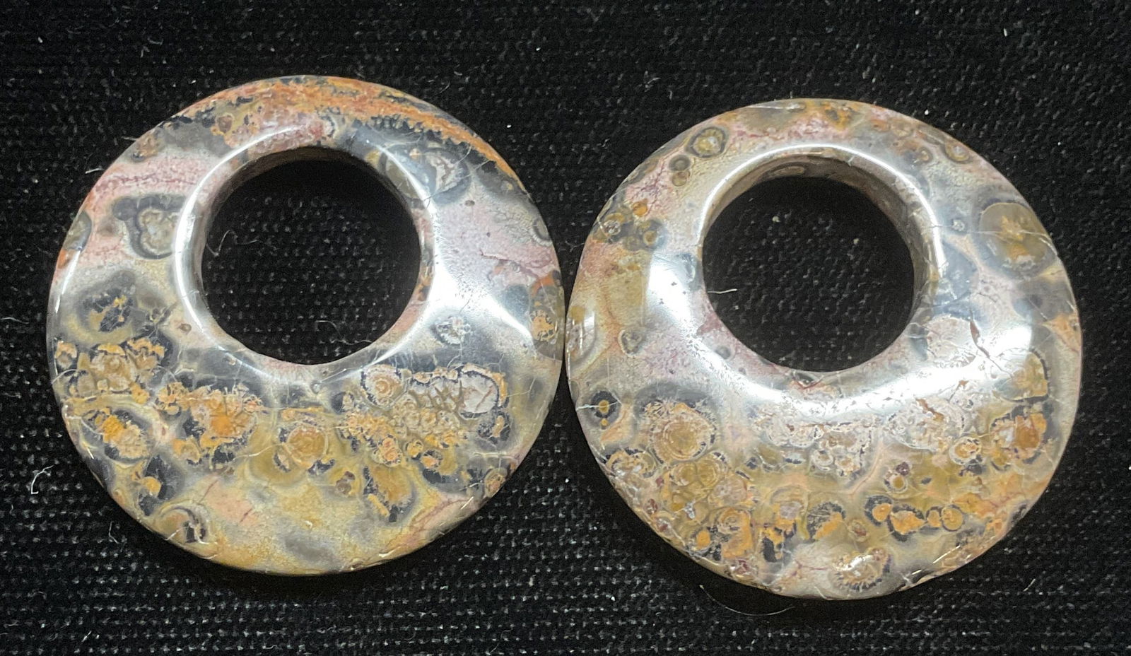 Pair Carved Round Stone Pendants (1 of 6)