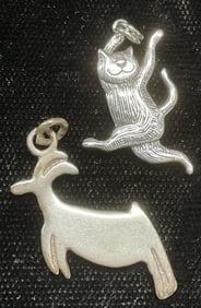 Lot 2 Signed Sterling Silver EG Cat & Ram Pendants