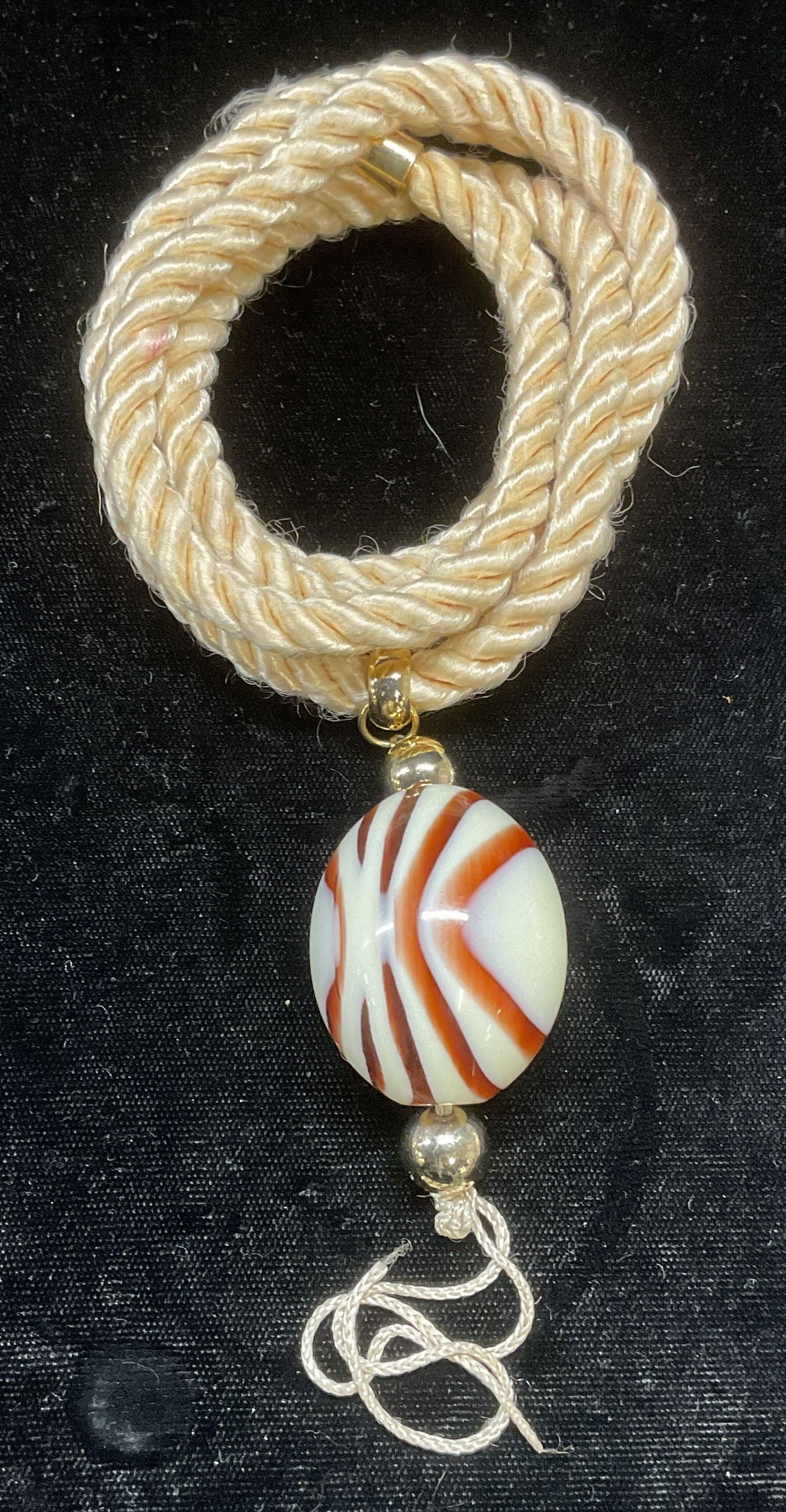 Beige Rope Banded Lucite Pendant Necklace: Banded lucite pendant necklace with beige twisted rope. Drop length approx 15 inches. Pendant approx 2 inches long. Some wear including scratching observed. Jewelry, estate jewelry, costume jewelry, c