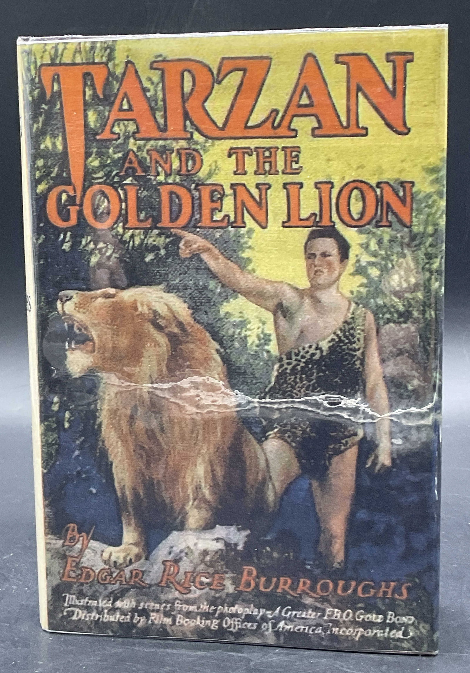 1924 TARZAN & THE GOLDEN LION Burroughs Illstr: TARZAN & THE GOLDEN LION by Edgar Rice Burroughs. Published by Grosset & Dunlap. C. 1924. Illustrated. Measures approx. 7.75L x 5.25W in. Discoloration, surface wear, and separation present. home deco