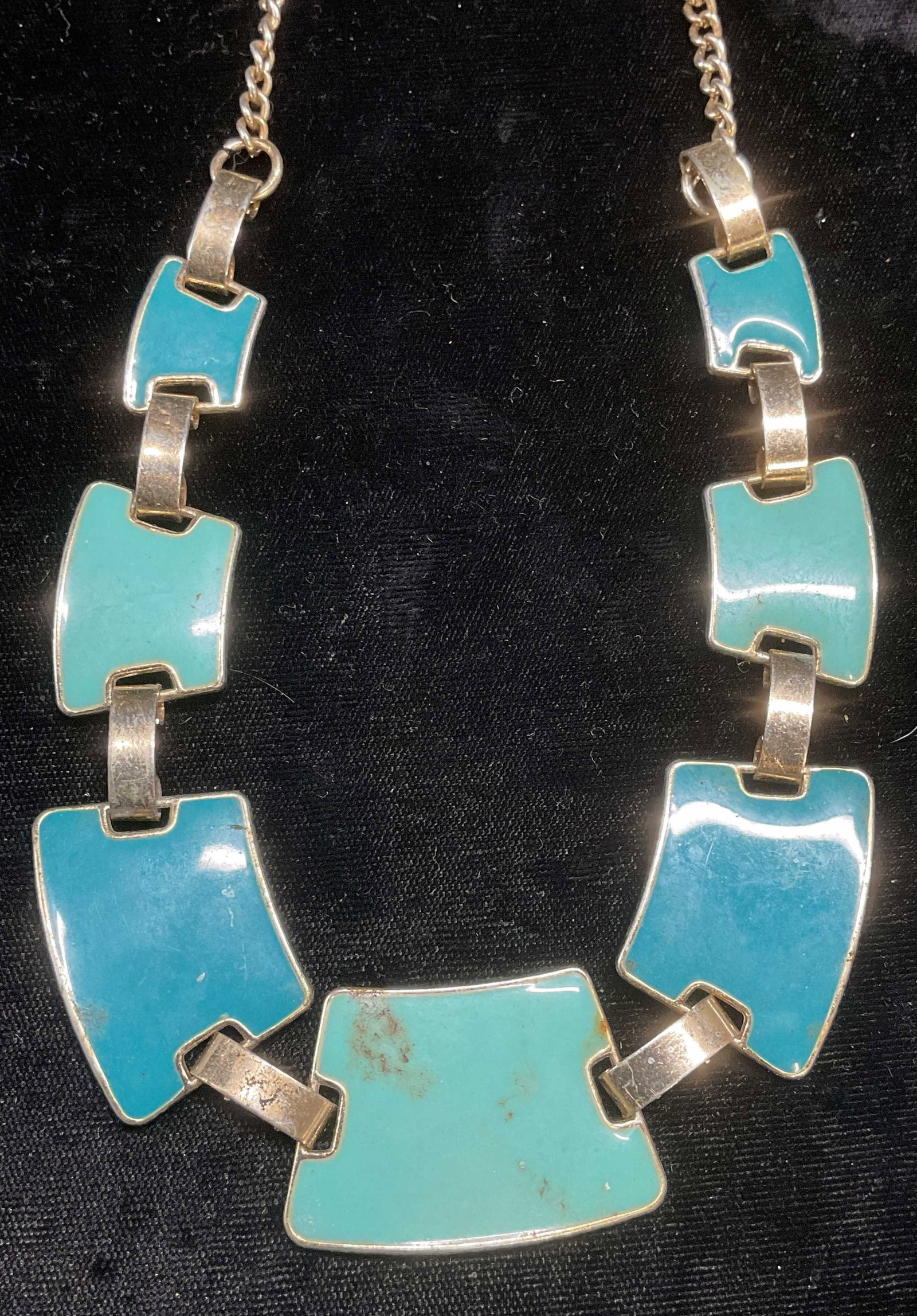 Signed Silver Tone Blue Enamel Necklace: Signed silver tone necklace with blue enamel panels. Signed C on hang tag. Drop length approx 9 inches. Some wear including scratching observed. Jewelry, estate jewelry, costume jewelry, cocktail jewe